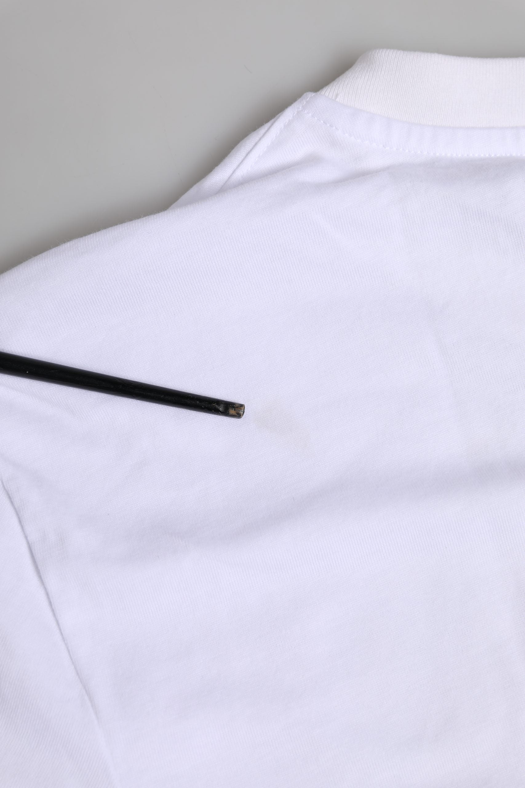 White long sleeve shirt with black zipper