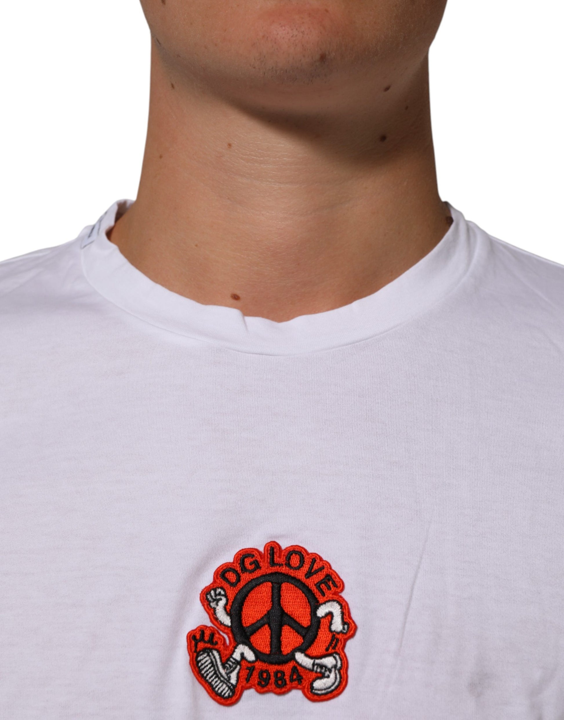 White t-shirt with red peace sign logo