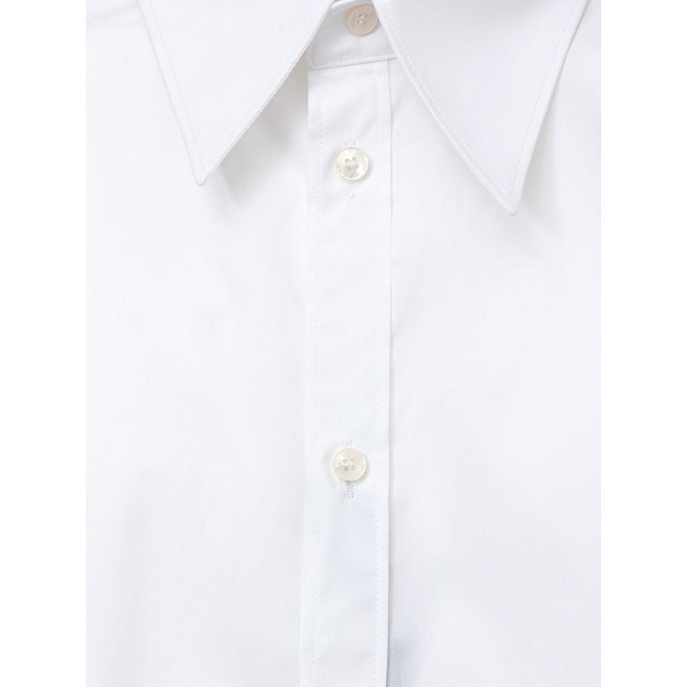 A white cotton dress shirt with a collar, buttons, and a pointed front