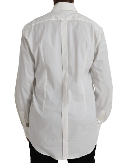 A white cotton dress shirt with a slim fit and gold accents on the collar
