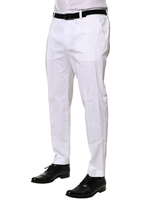 White cotton dress pants with belt loops, front pockets, and a zipper fly
