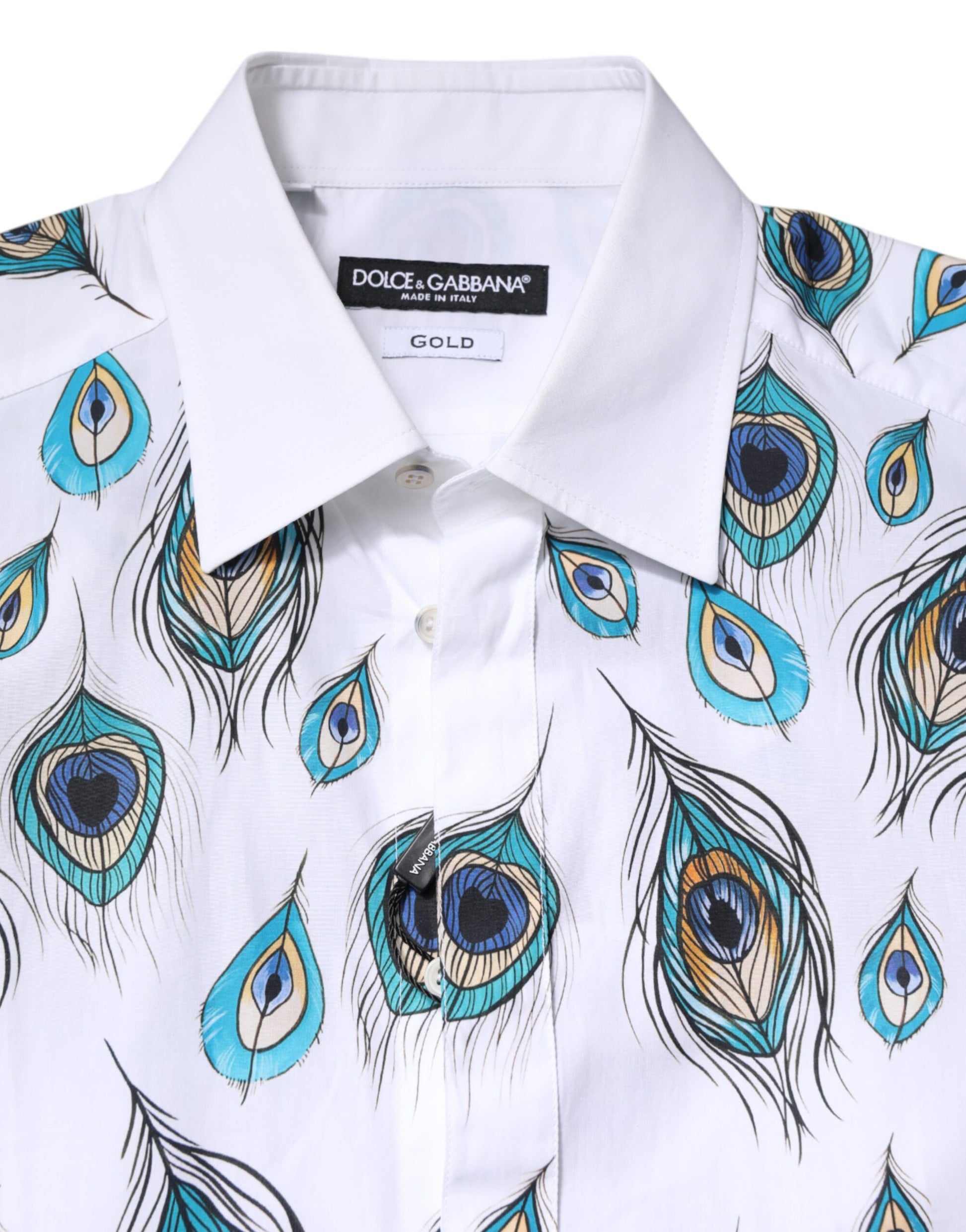A white cotton dress shirt with a feather print design, featuring blue and gold peacock feathers