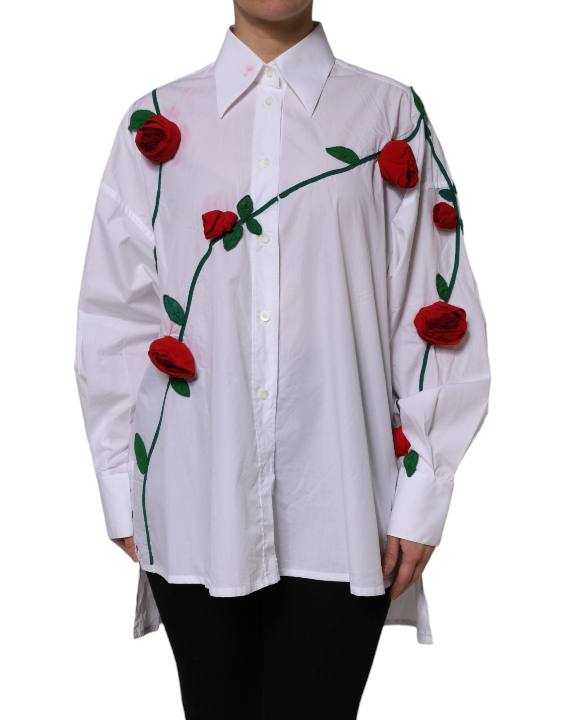 A white cotton dress shirt with floral appliques featuring red roses and green leaves