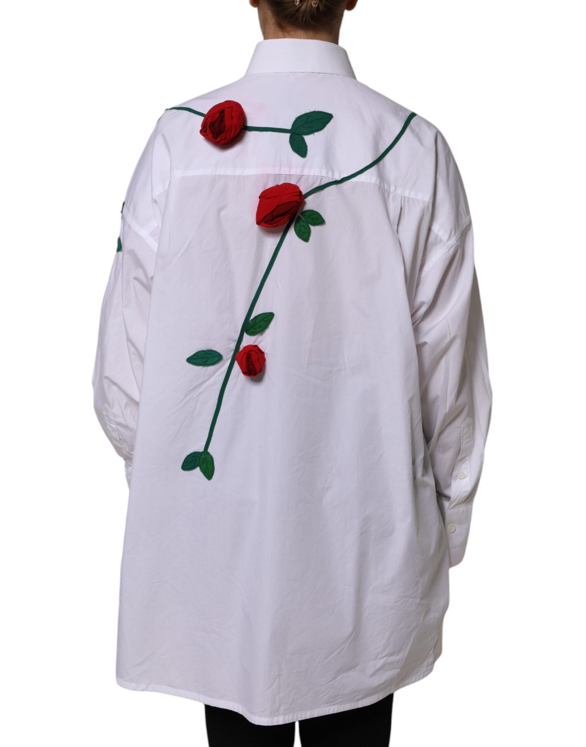 A white cotton dress shirt with floral appliques and a rose design on the back