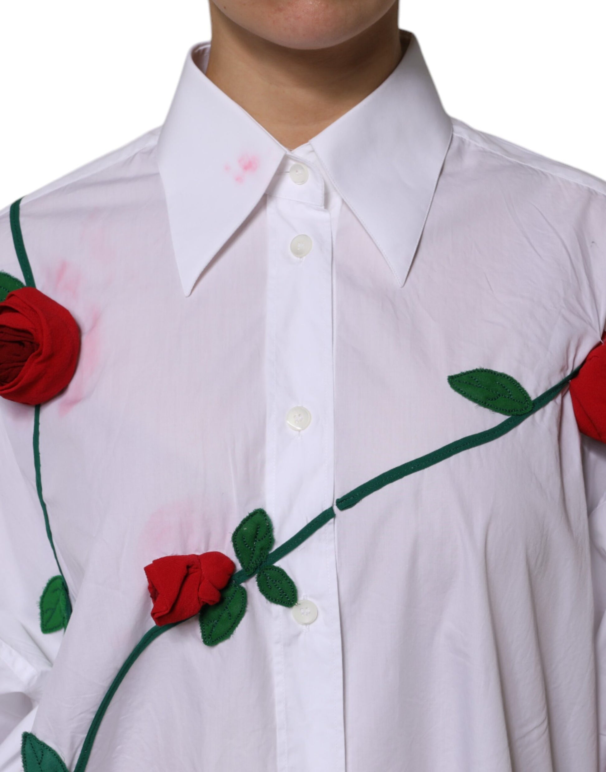 A white cotton dress shirt with floral applique detailing