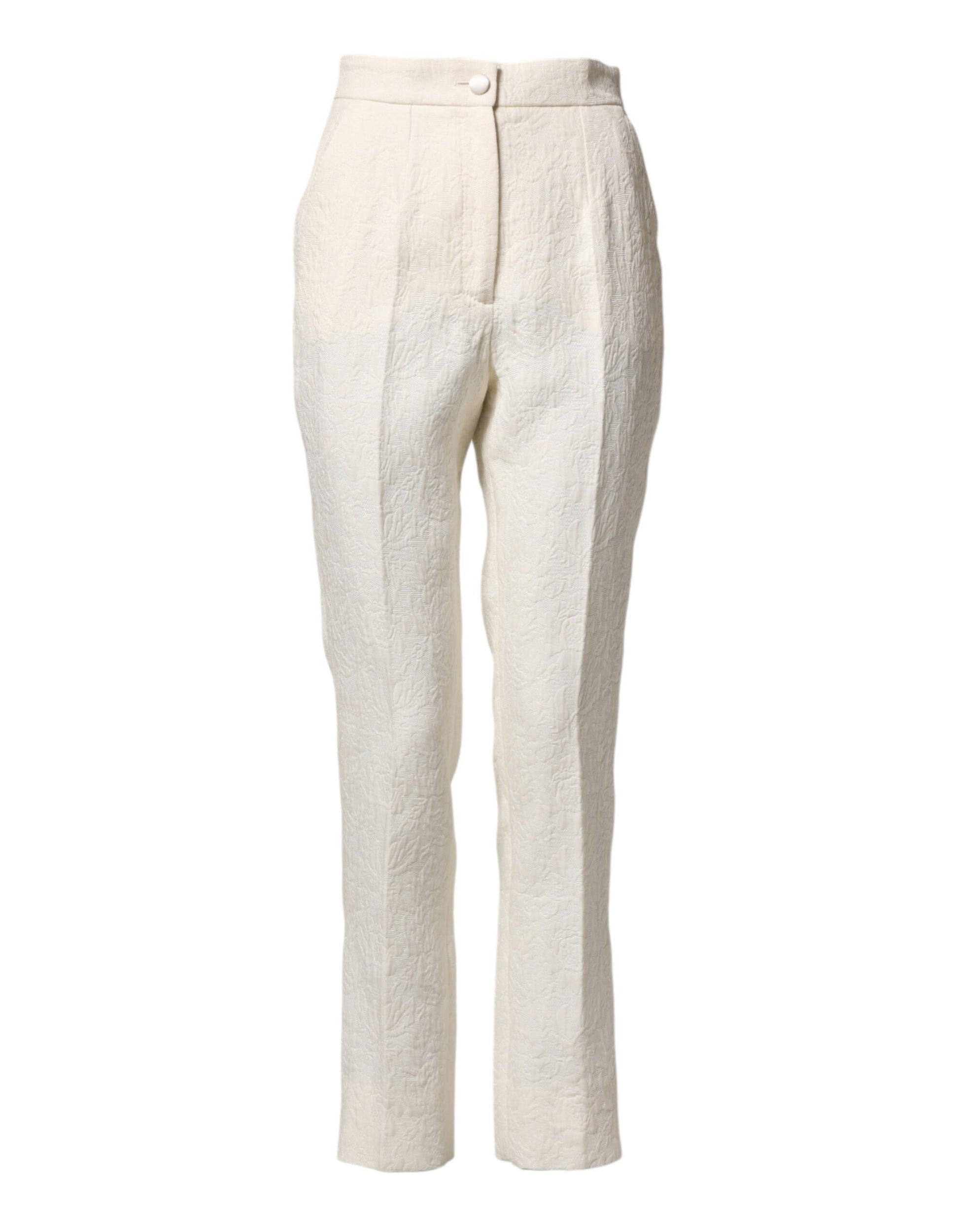 A pair of white cotton floral brocade dress pants by Dolce & Gabbana