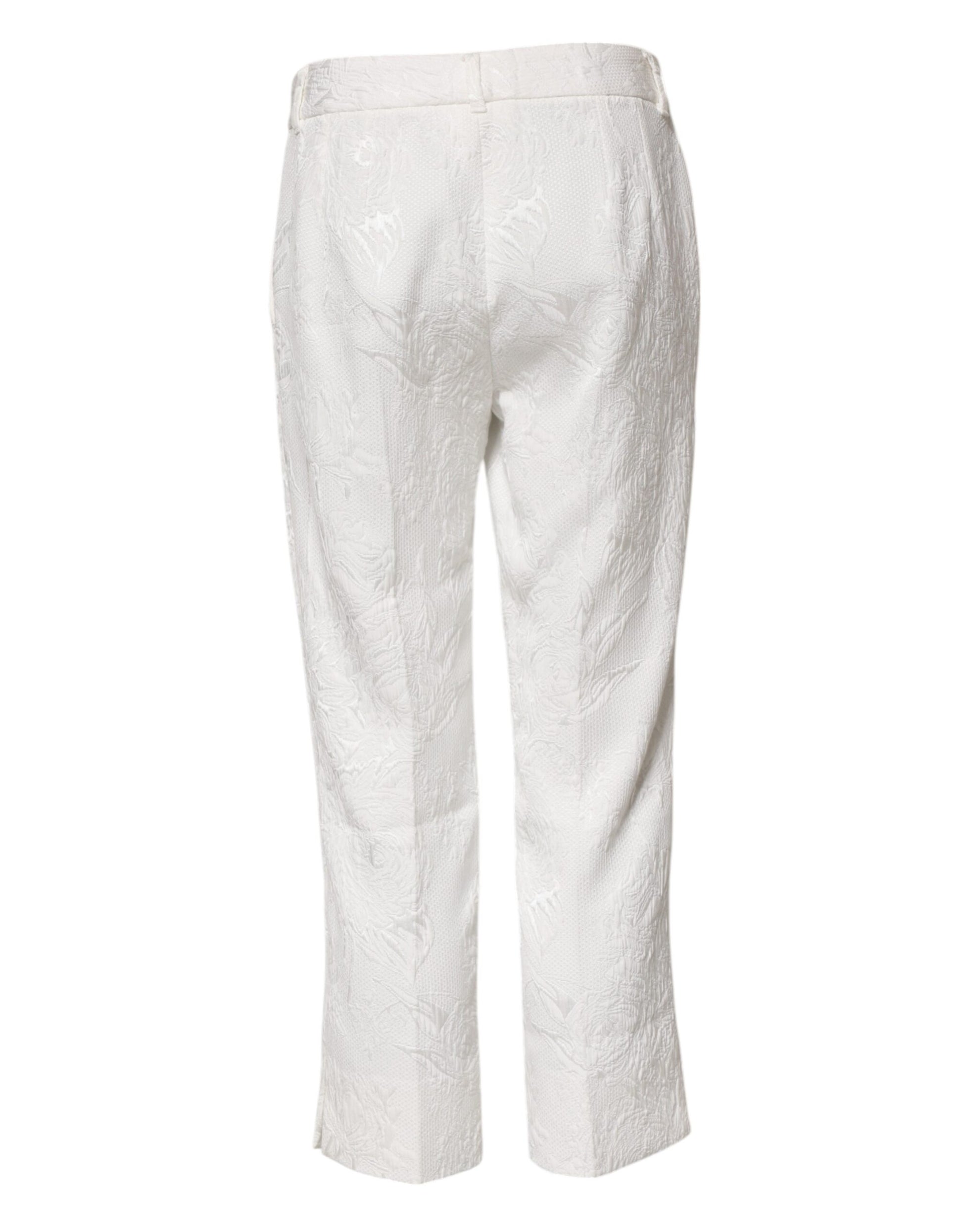 White pants with embroidered pattern