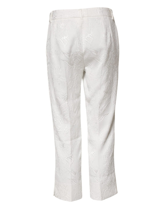 White pants with embroidered pattern
