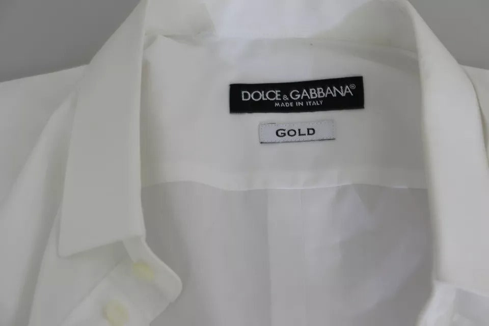 A white cotton formal dress top from Dolce & Gabbana with a gold label