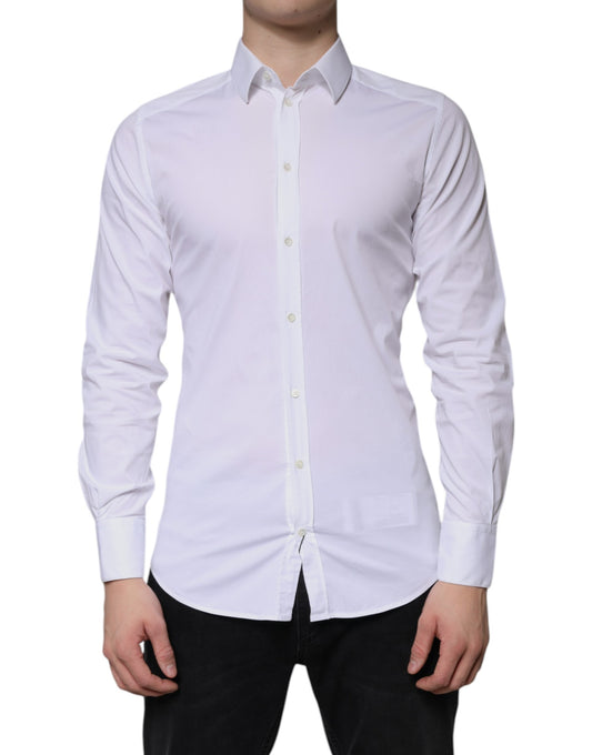 A white cotton formal men's dress shirt with gold buttons and a collar