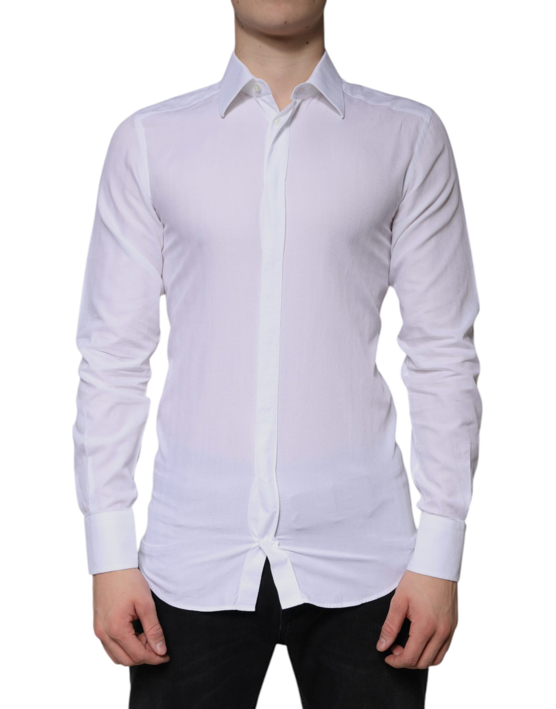 A white cotton dress shirt with long sleeves, collar and button-up front