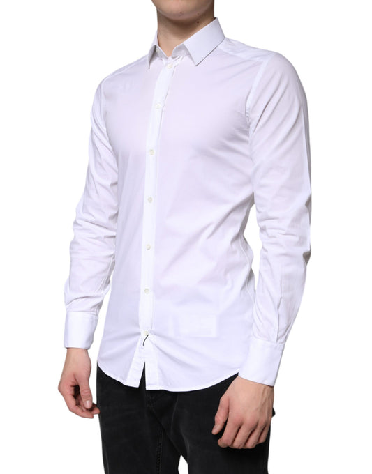 A white cotton dress shirt with long sleeves and a collar, designed for formal wear