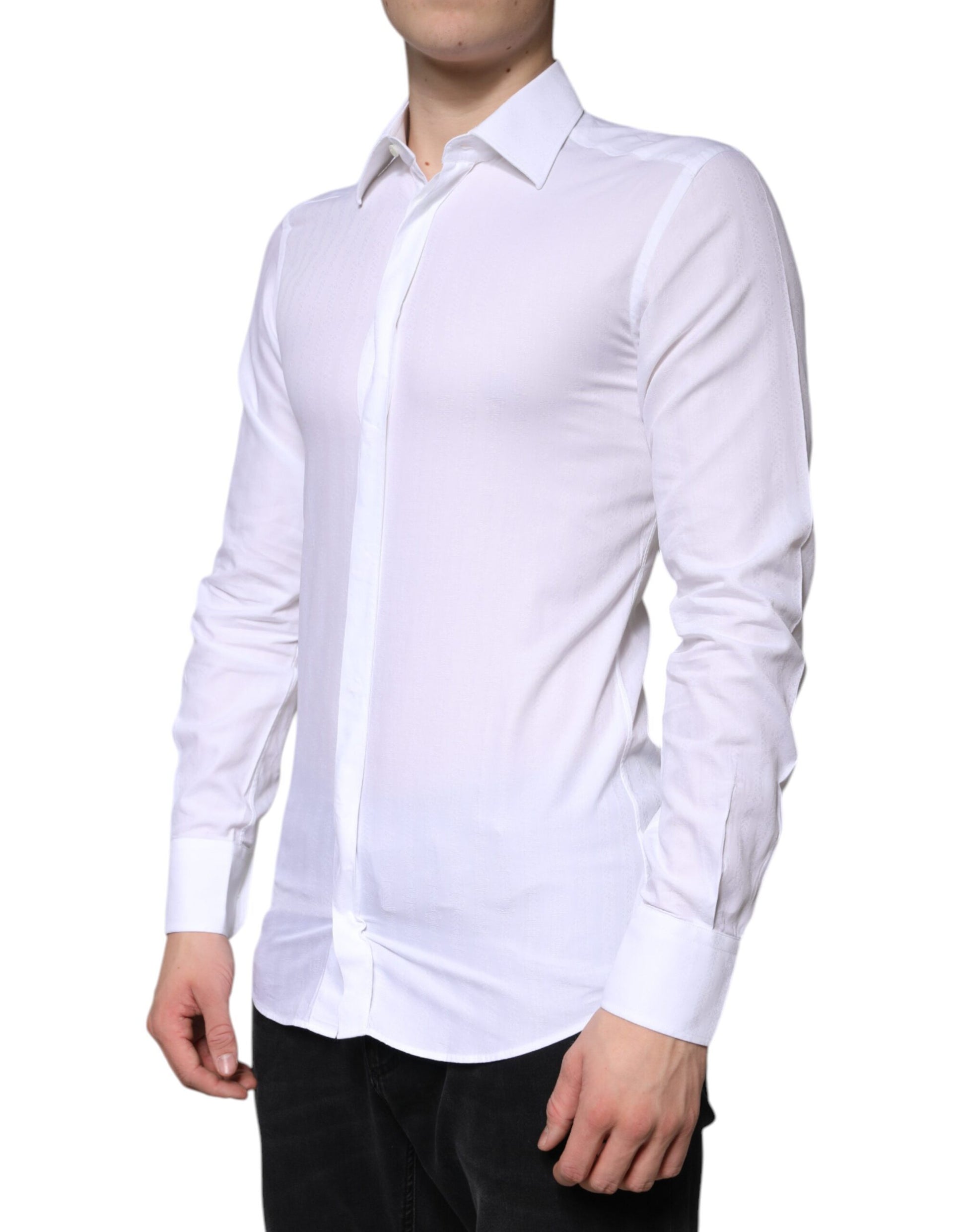 A white cotton dress shirt with a collar and long sleeves, designed for formal men's wear