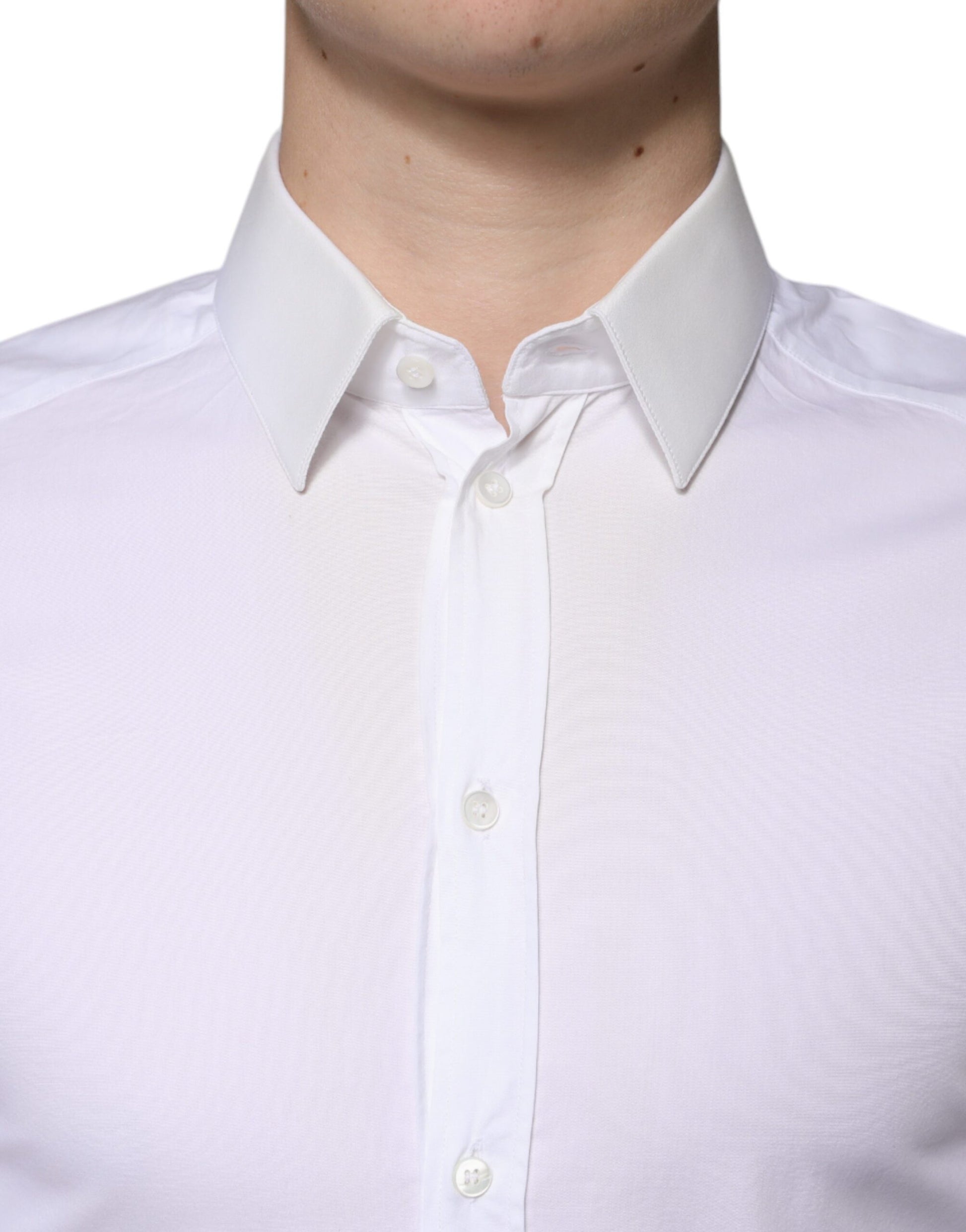 A white cotton dress shirt with a collar and buttons, designed for formal wear