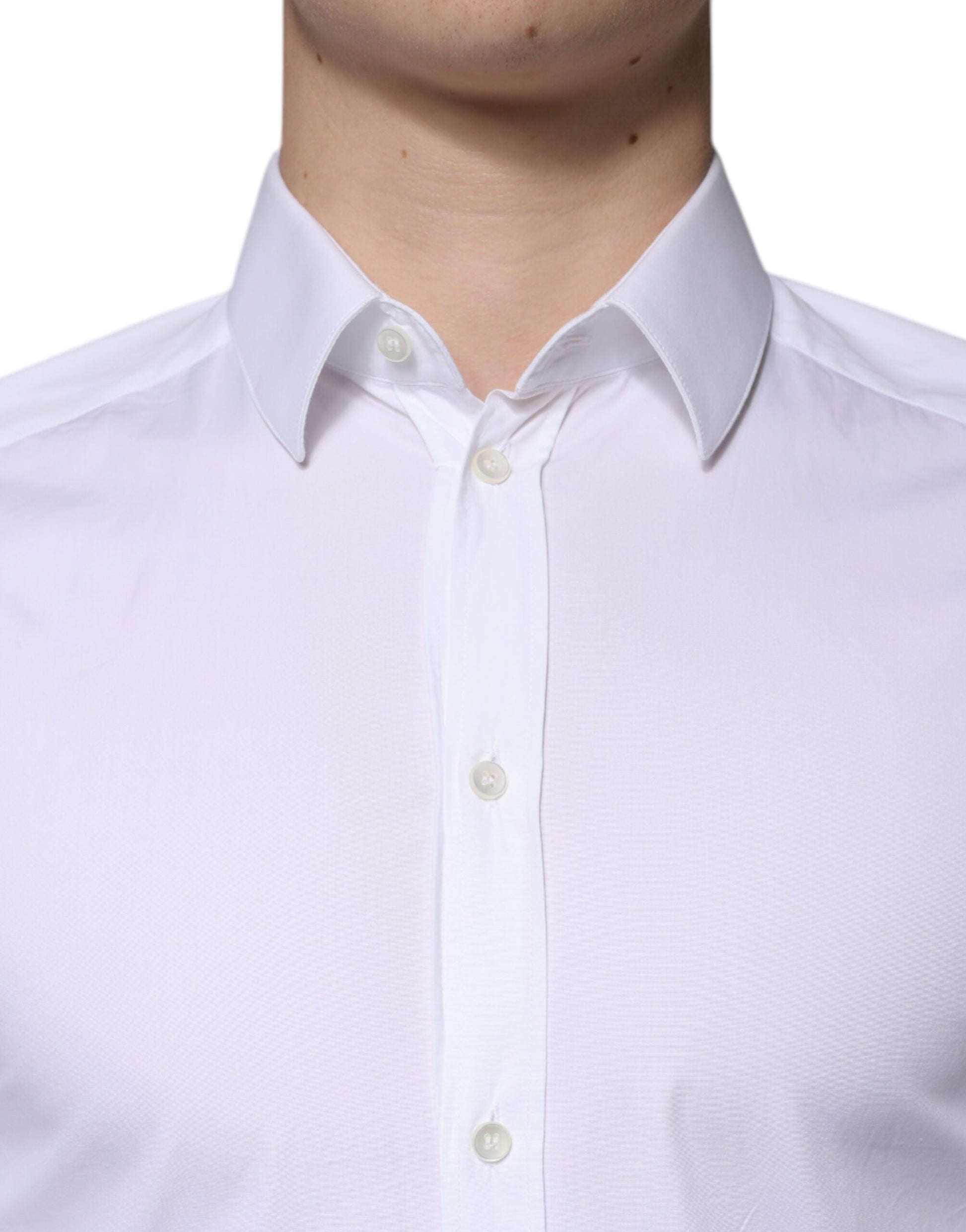 A white cotton dress shirt with a gold collar and buttons, designed for formal men's wear