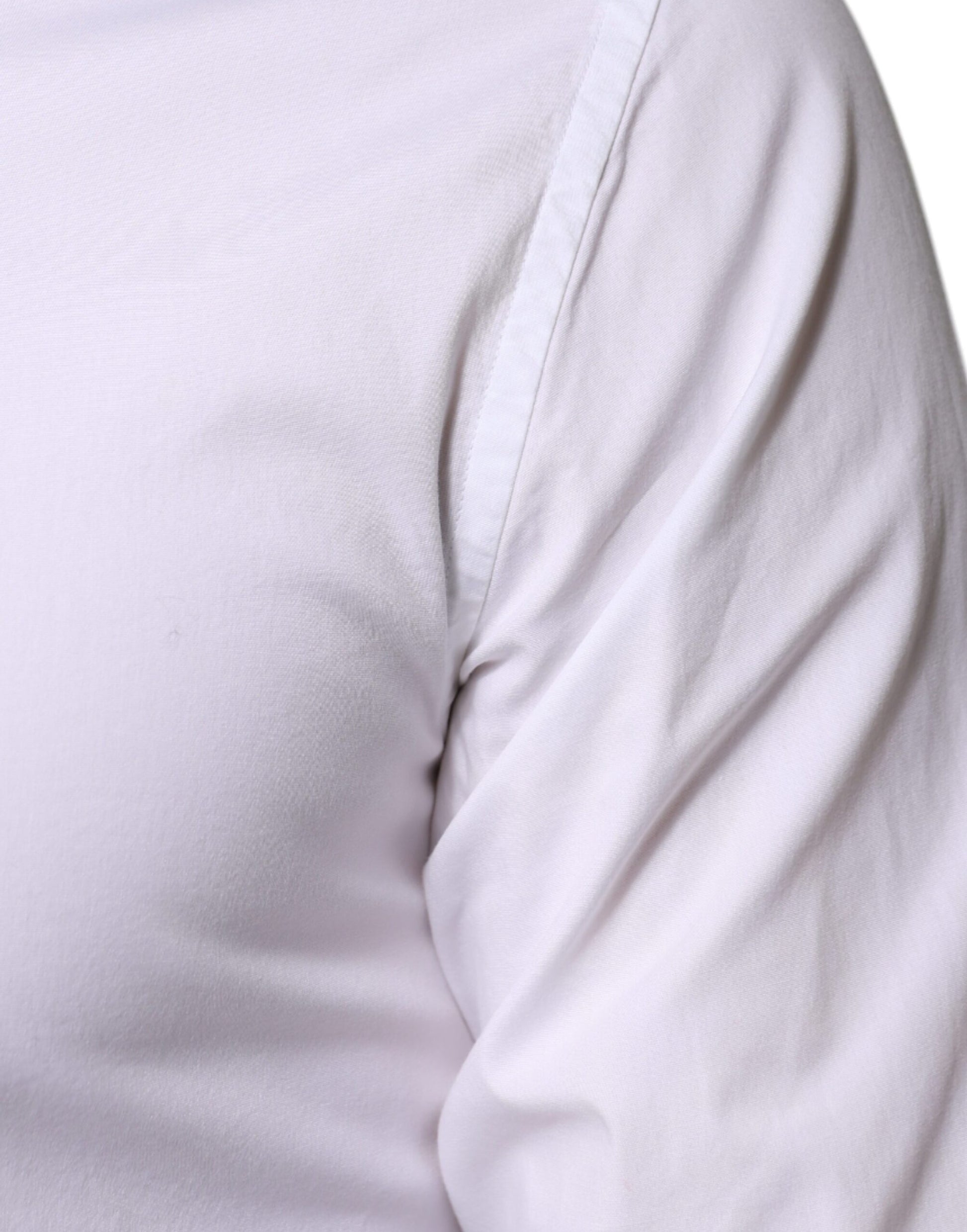A white cotton formal men's dress shirt with a gold stripe on the sleeve