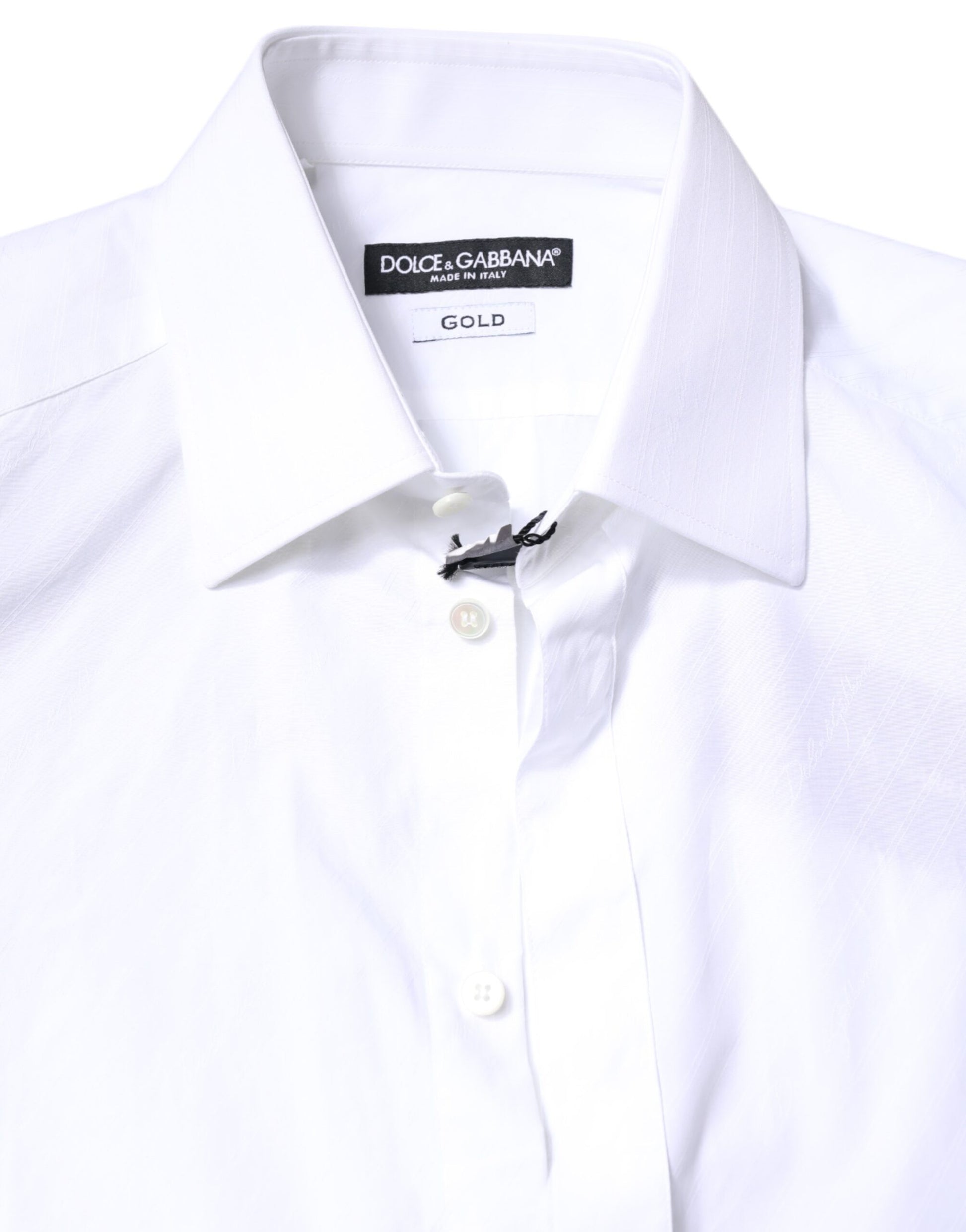 A white cotton dress shirt with a collar, featuring the brand name "Dolce & Gabbana" and a gold label