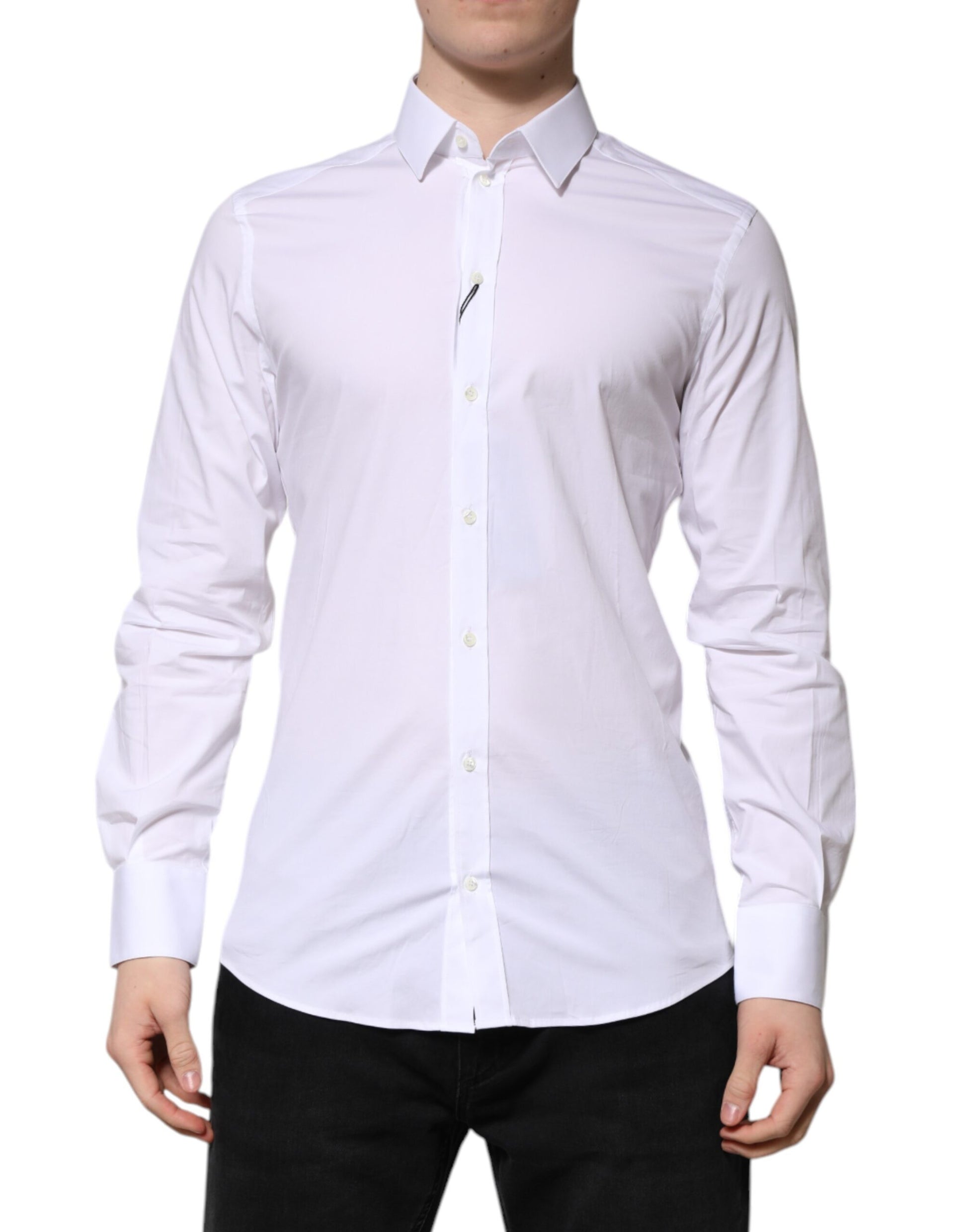 A long sleeved white cotton dress shirt with gold accents from the brand Dolce & Gabbana