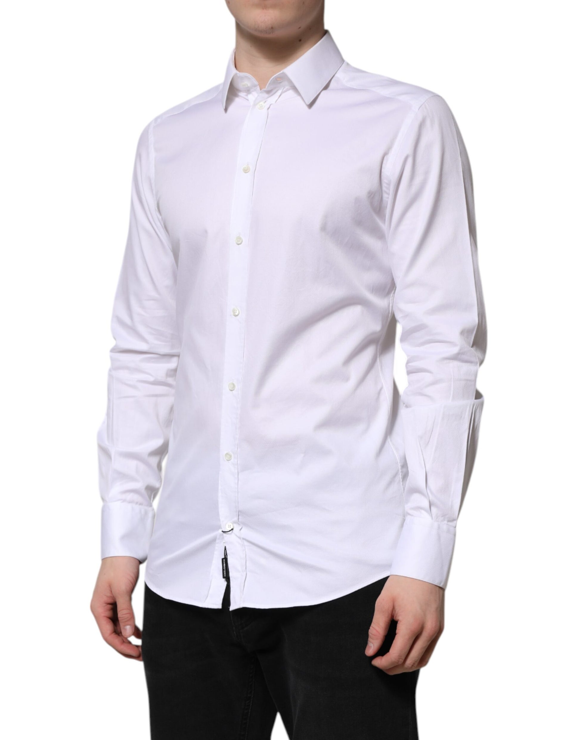 A long sleeved white cotton dress shirt with a gold design on the collar
