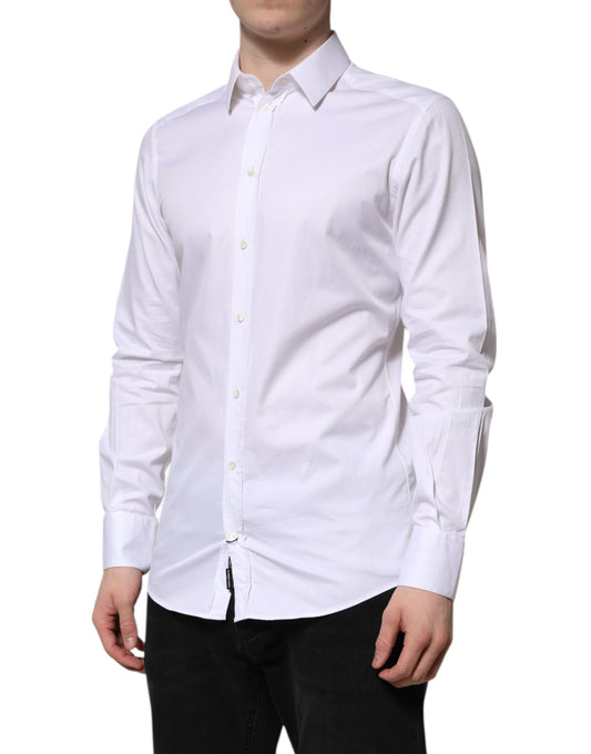 A long sleeved white cotton dress shirt with a gold design on the collar