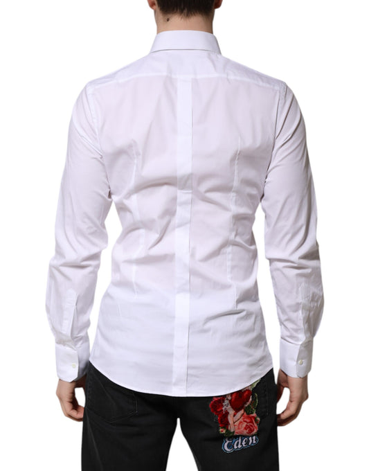 A long sleeve men's dress shirt with a gold design on the back