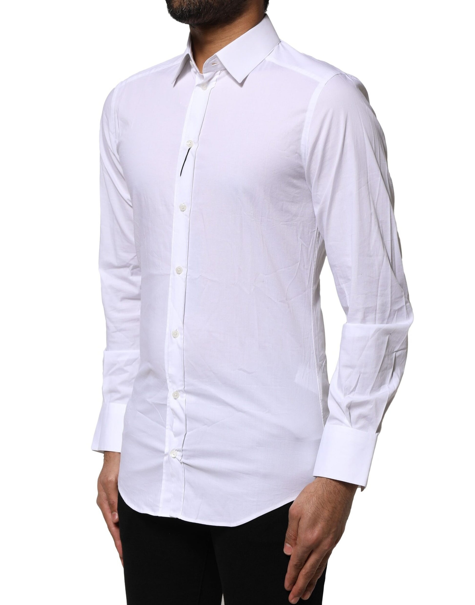 A long sleeve white cotton dress shirt with gold accents