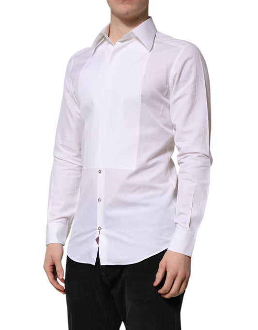 A mannequin wearing a white cotton dress shirt with long sleeves. The shirt features a gold design on the col