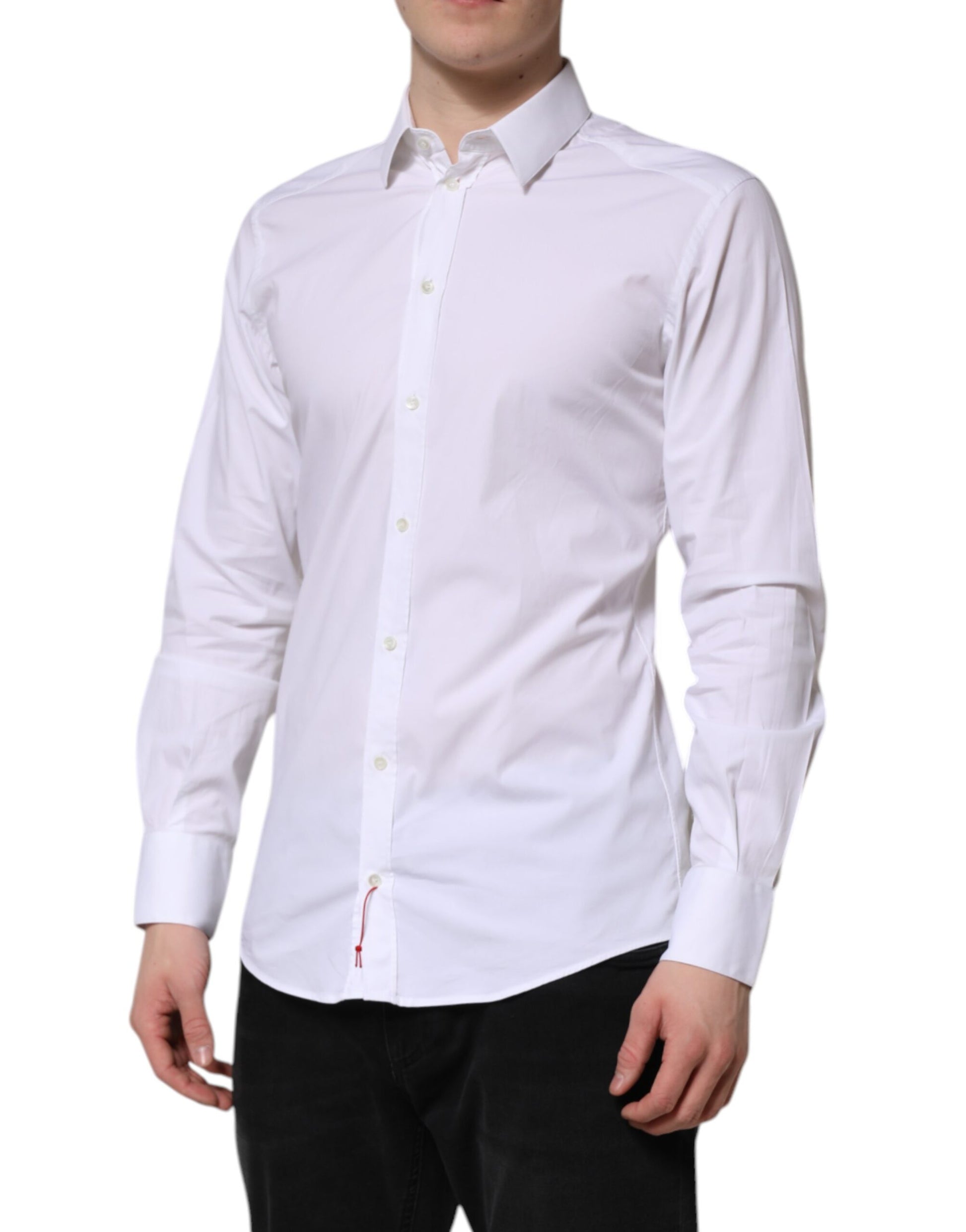 A long sleeve white cotton dress shirt with a gold design on the collar