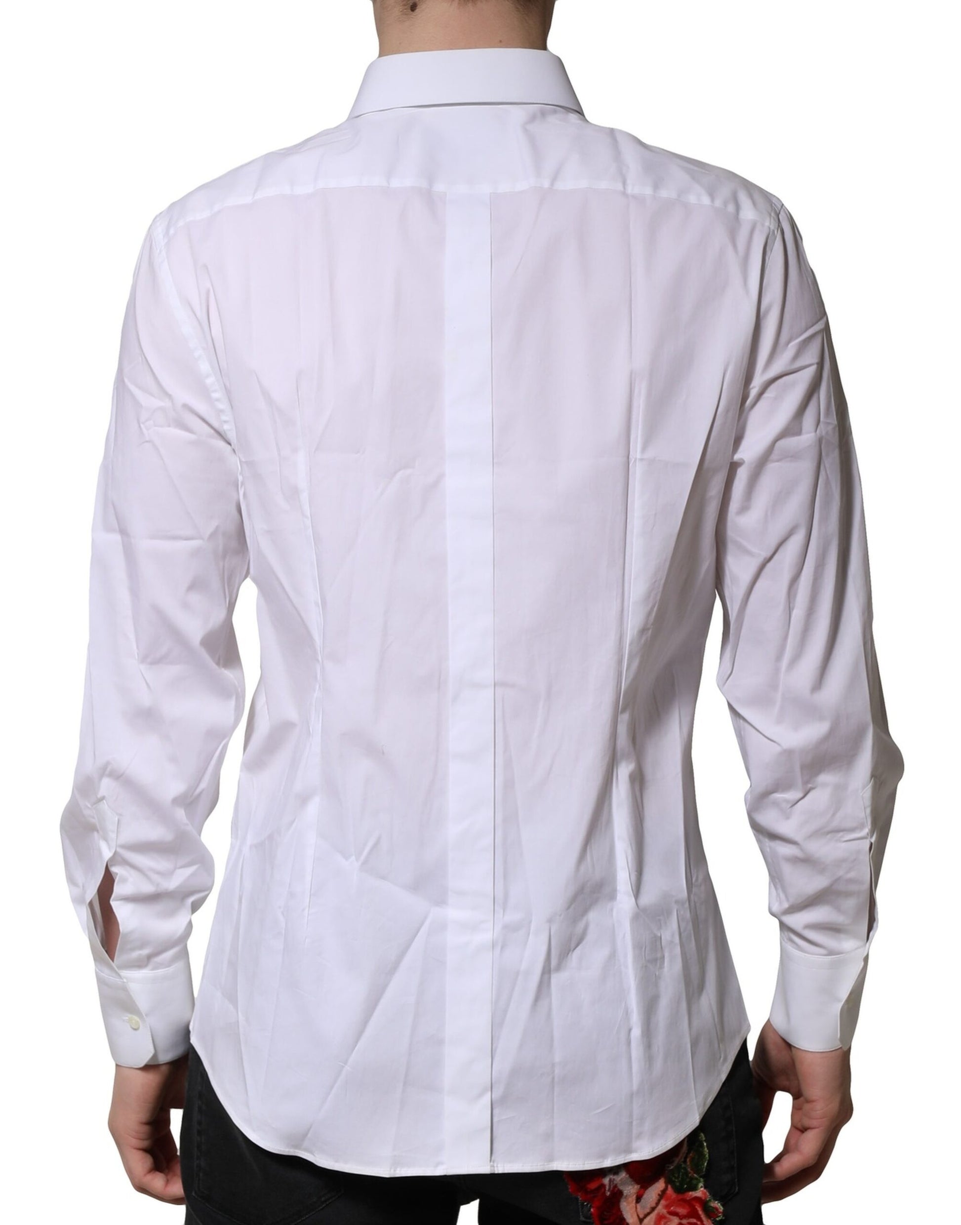 A long sleeve white cotton dress shirt with a gold design on the back