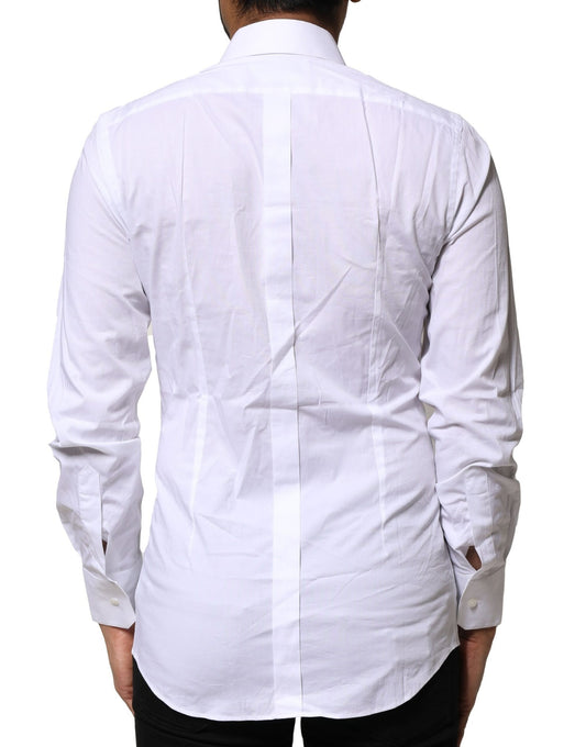 A long sleeve white cotton dress shirt with a gold design on the back