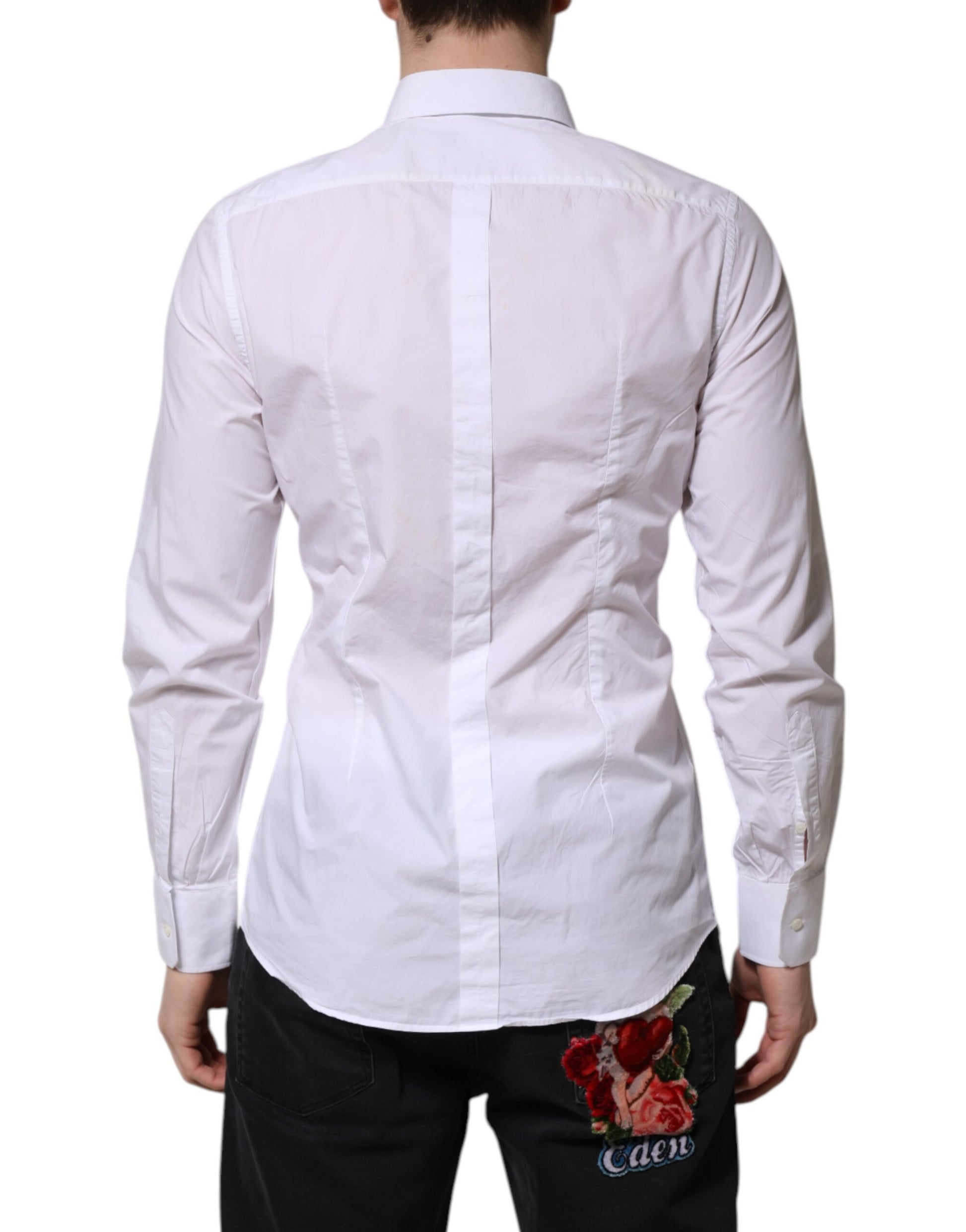 A white cotton dress shirt with long sleeves, featuring a gold design on the back