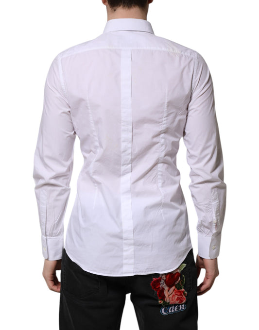 A white cotton dress shirt with long sleeves, featuring a gold design on the back