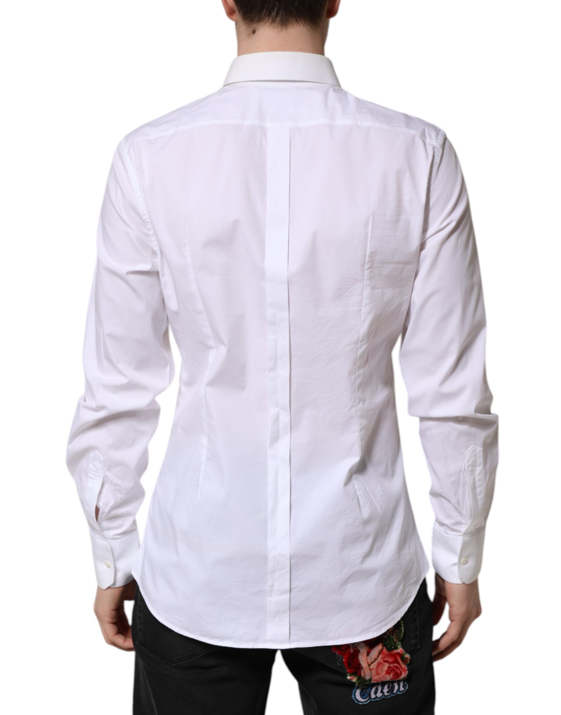 A long sleeve white cotton dress shirt with gold accents from the brand Dolce & Gabbana