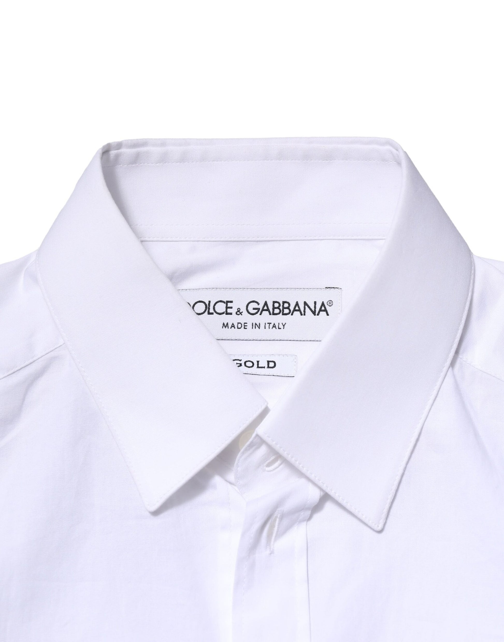 White cotton dress shirt with long sleeves, gold branding on collar and chest