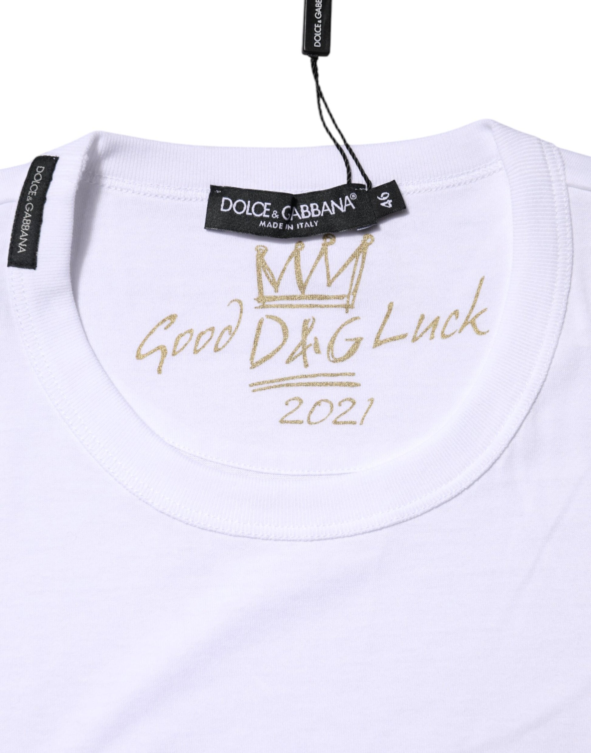 White t-shirt with gold lettering