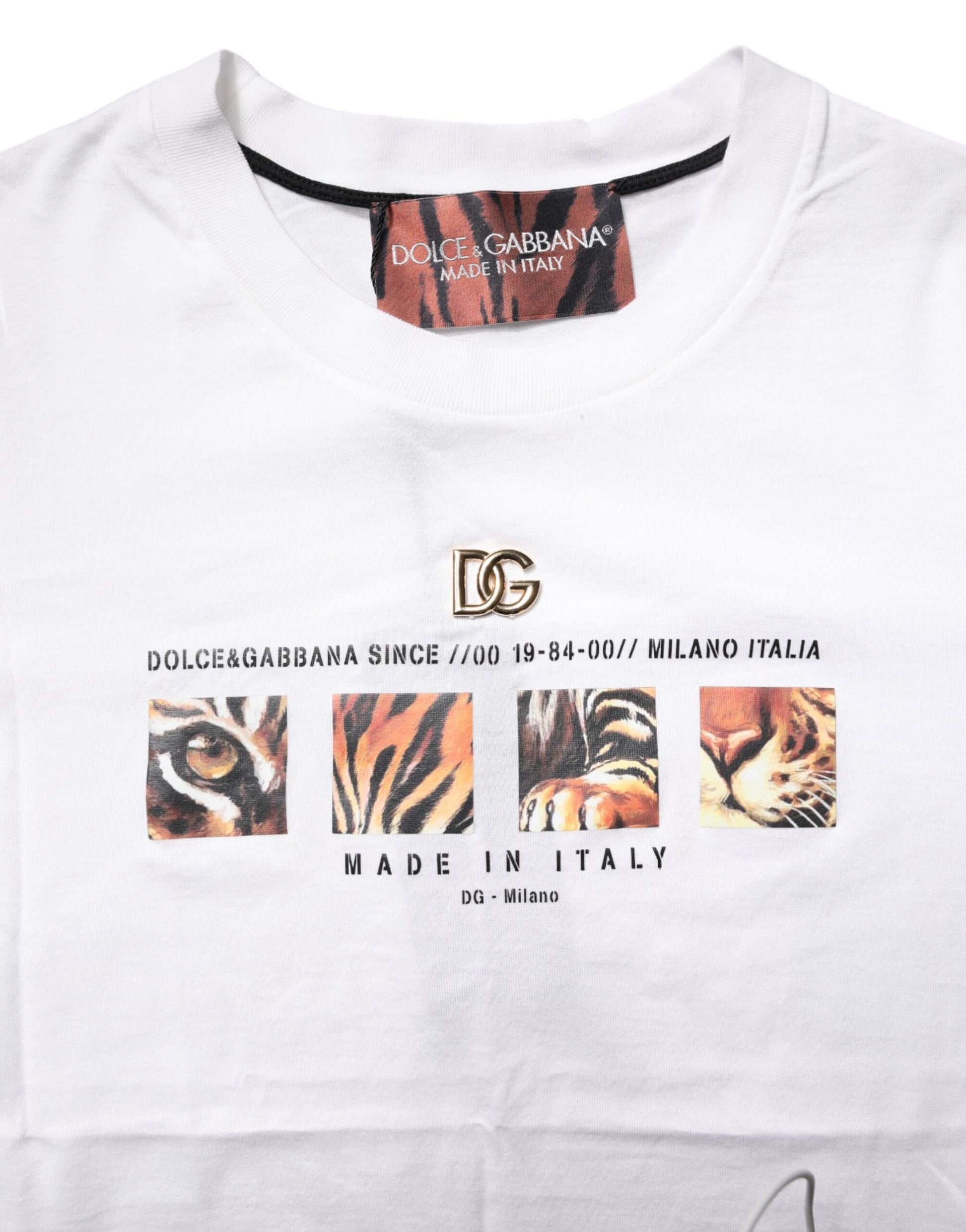 White t-shirt with graphic design featuring three tigers