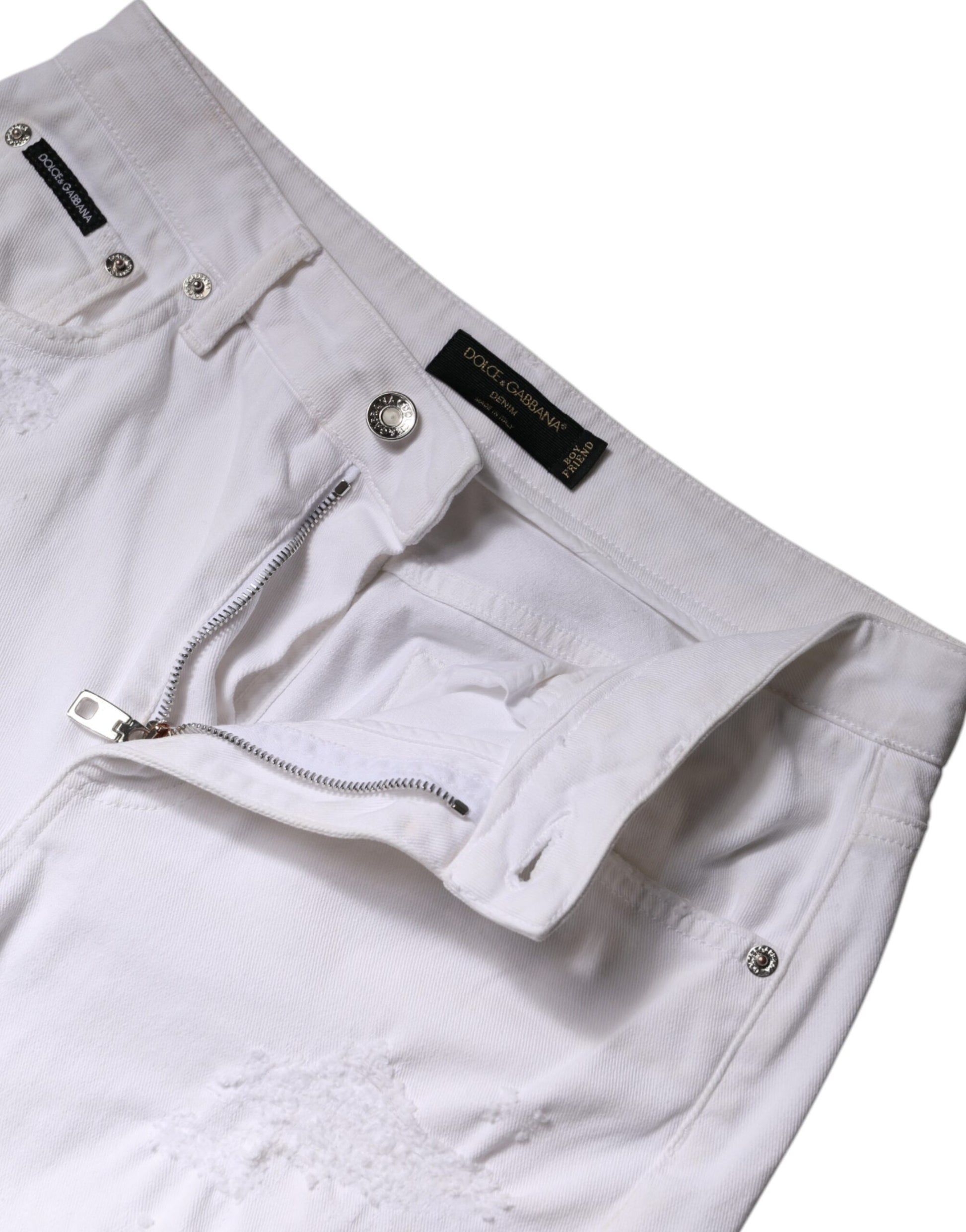 Pair of light wash jeans with zippered front