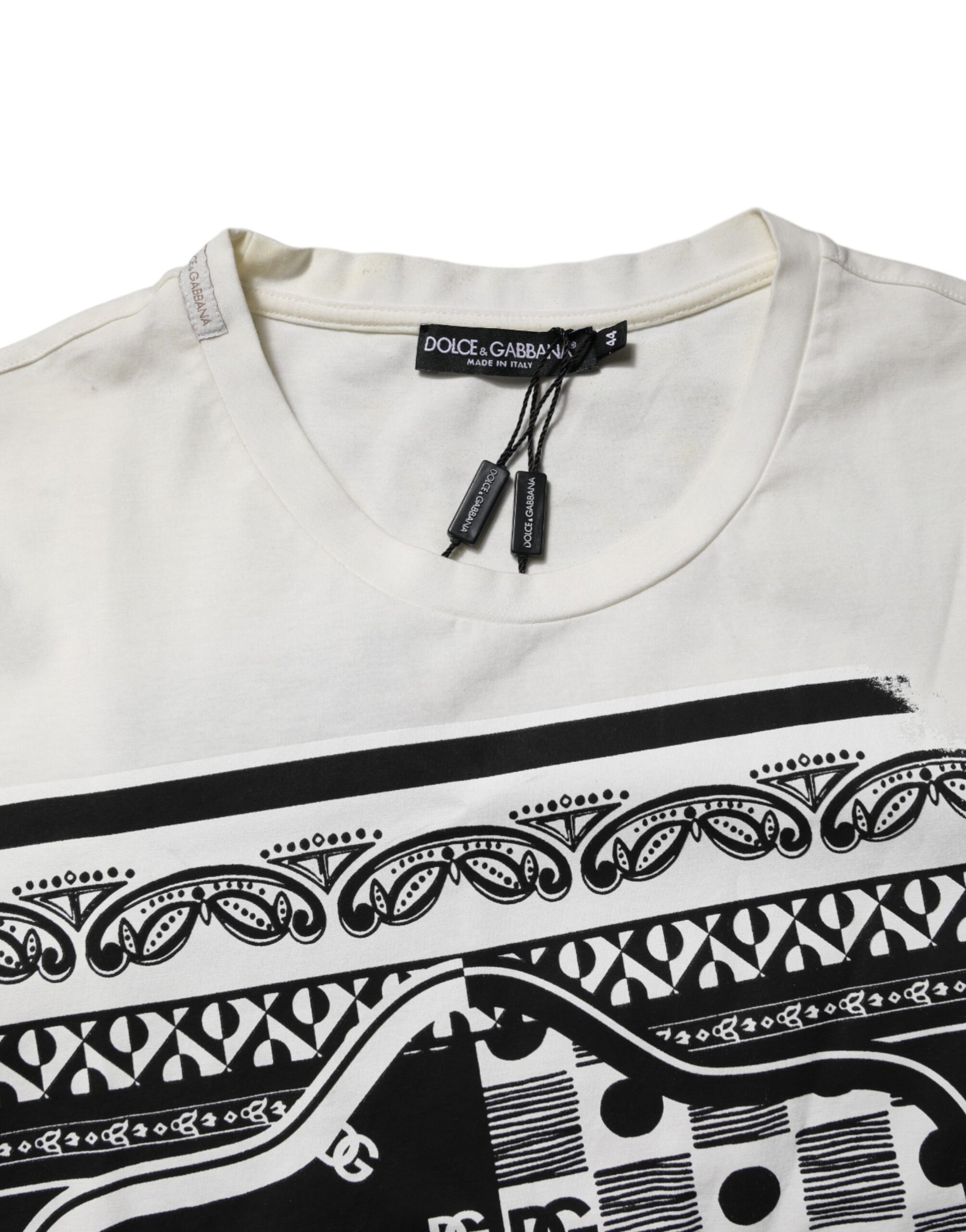 Tan t-shirt with black design on front