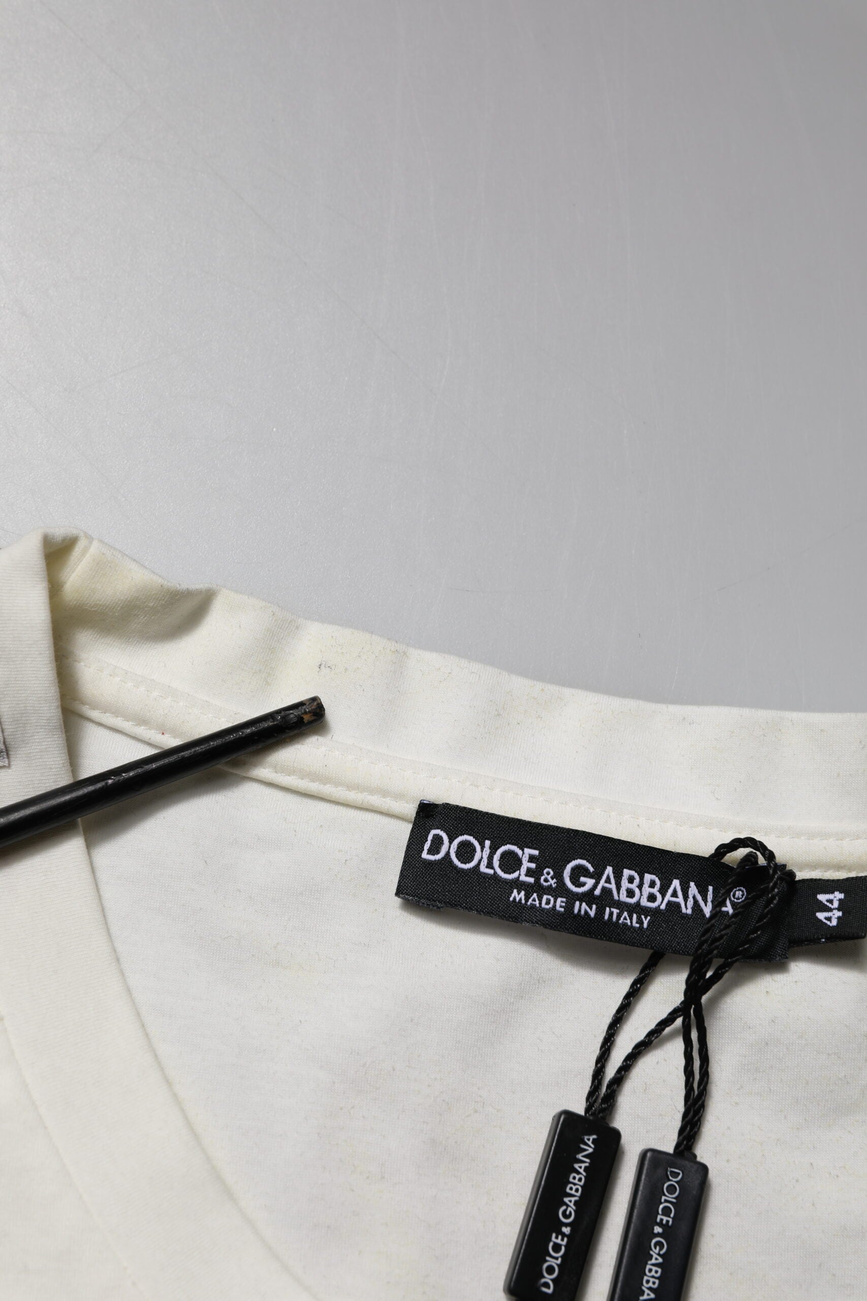 Yellow cotton t-shirt with black tag on neckline