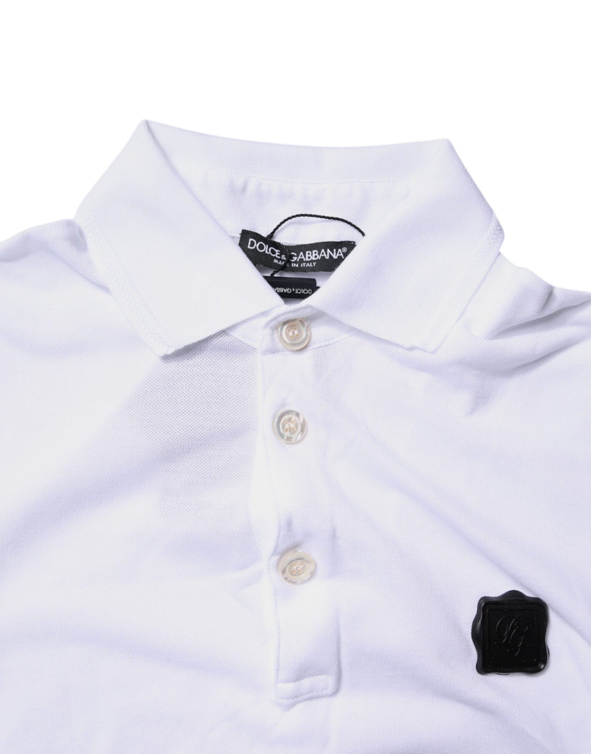 White polo shirt with black buttons and pocket