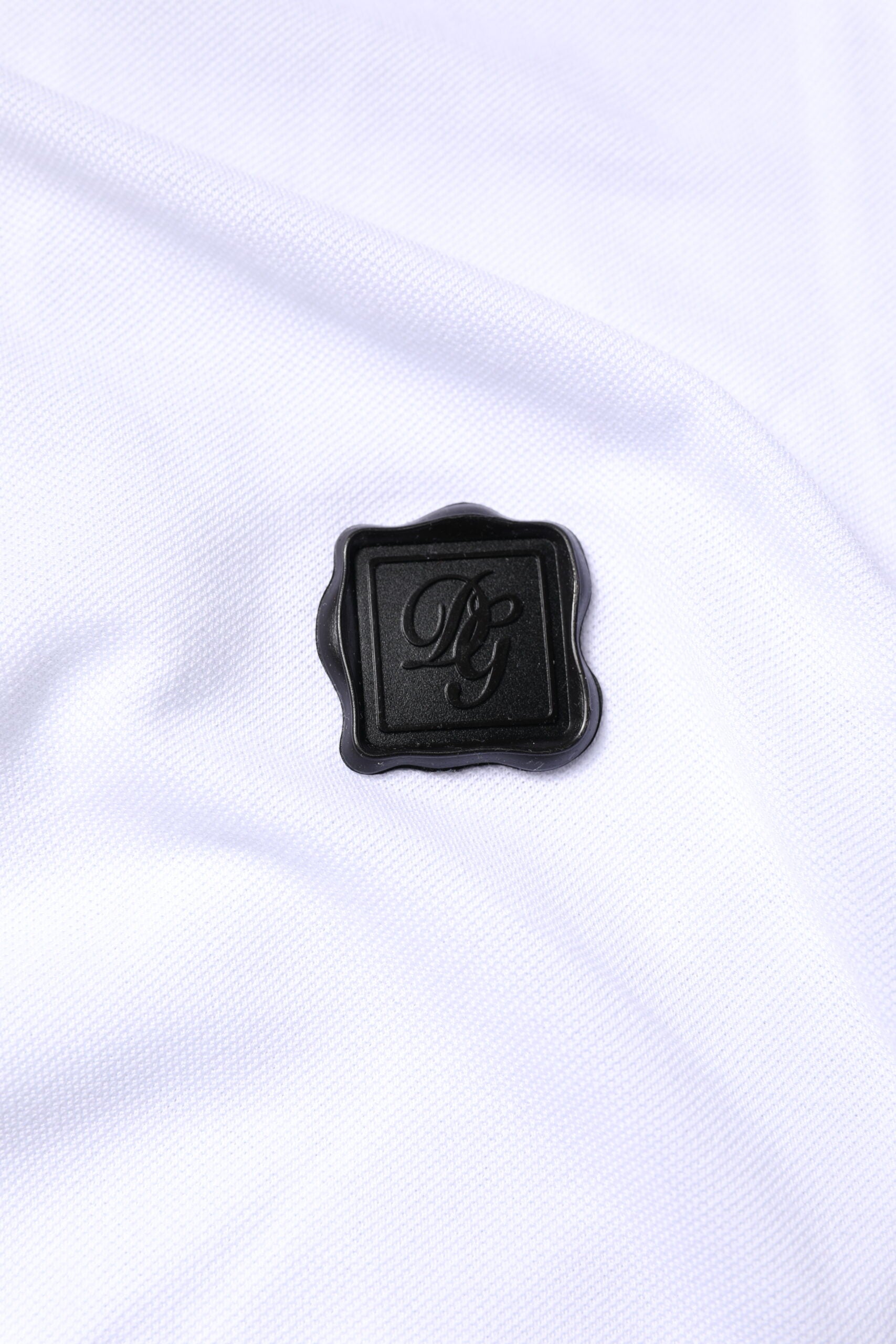 Black logo on white fabric