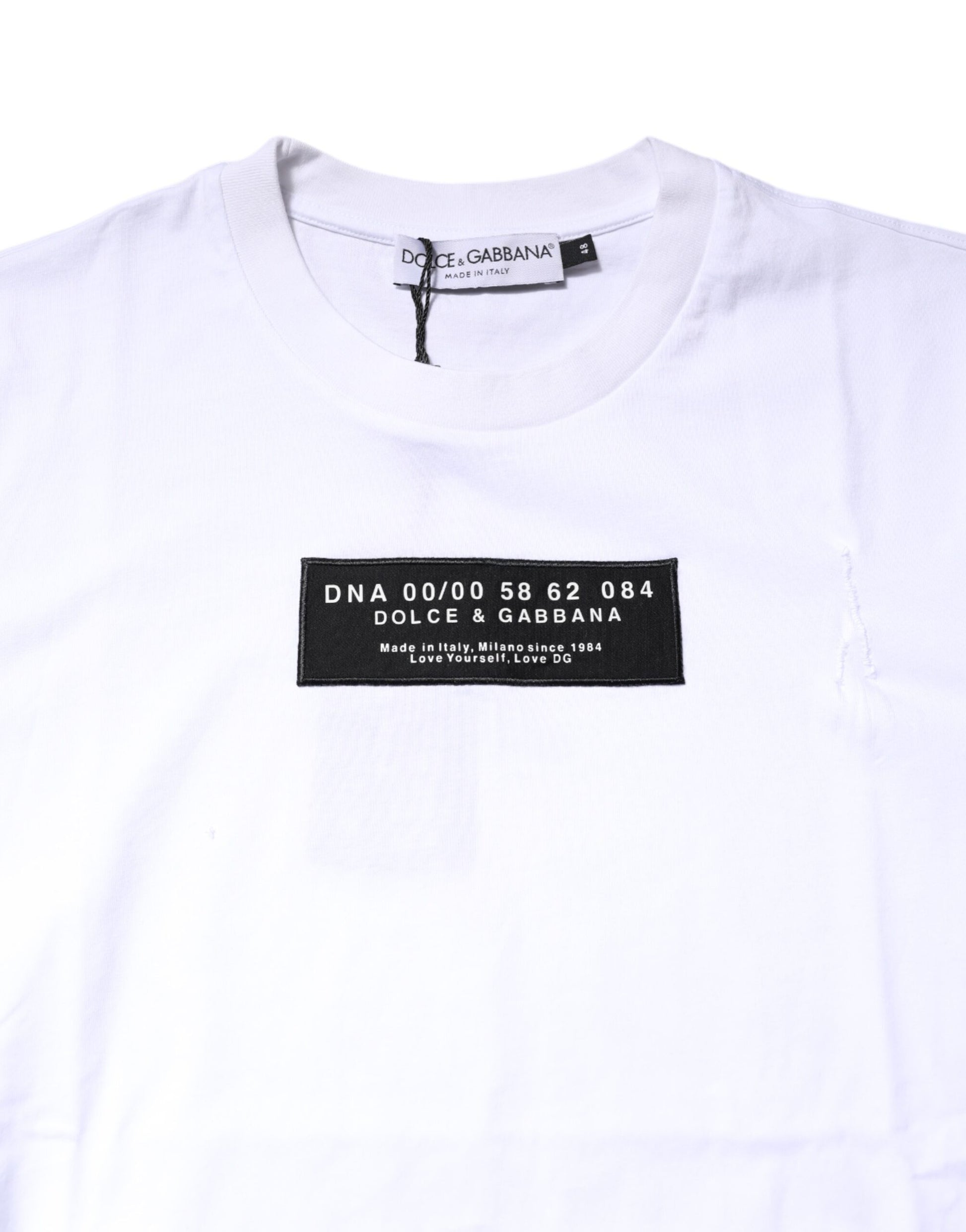 White t-shirt with black text on front