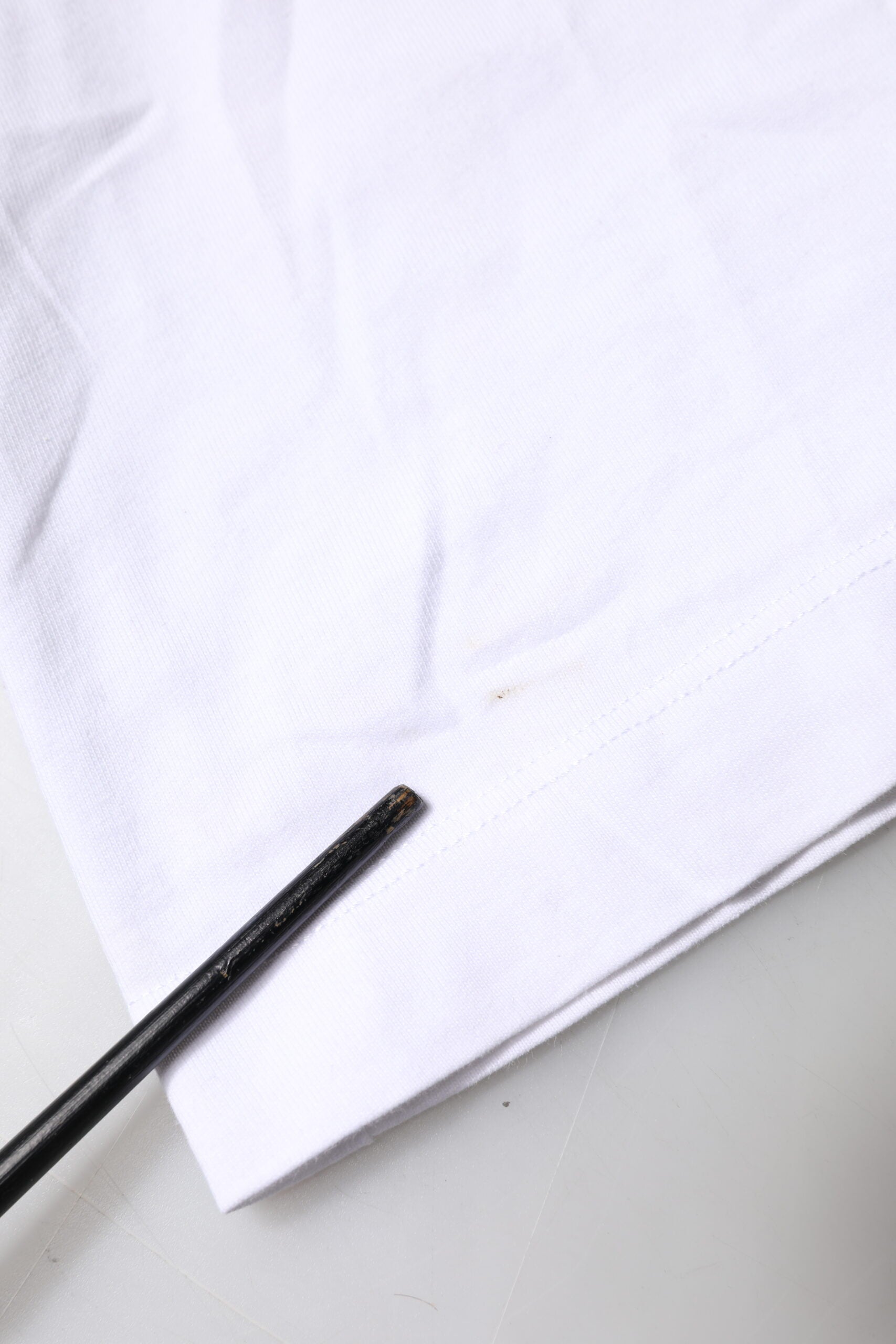 Black chopsticks on white napkin