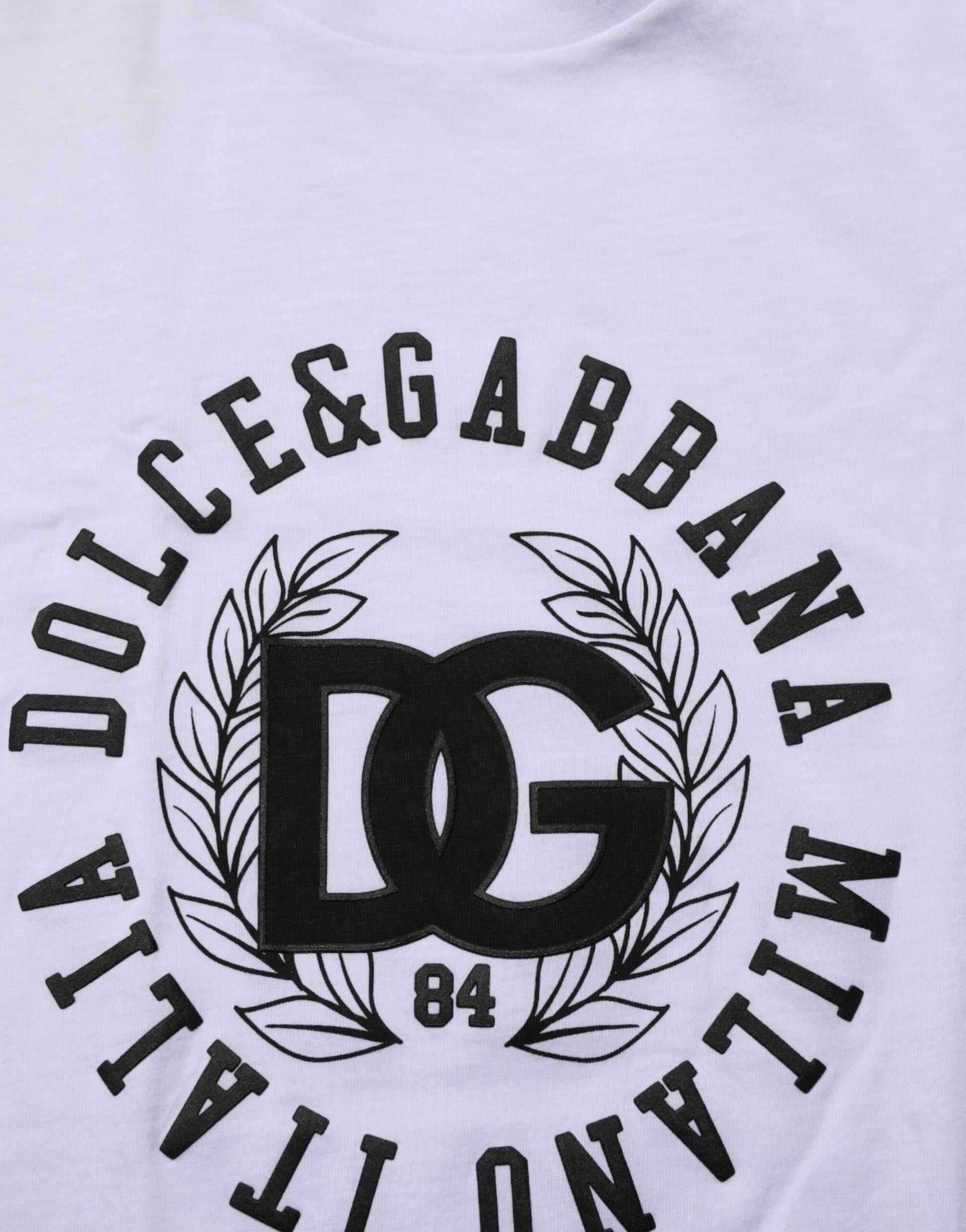 White t-shirt with black lettering featuring brand names and logos