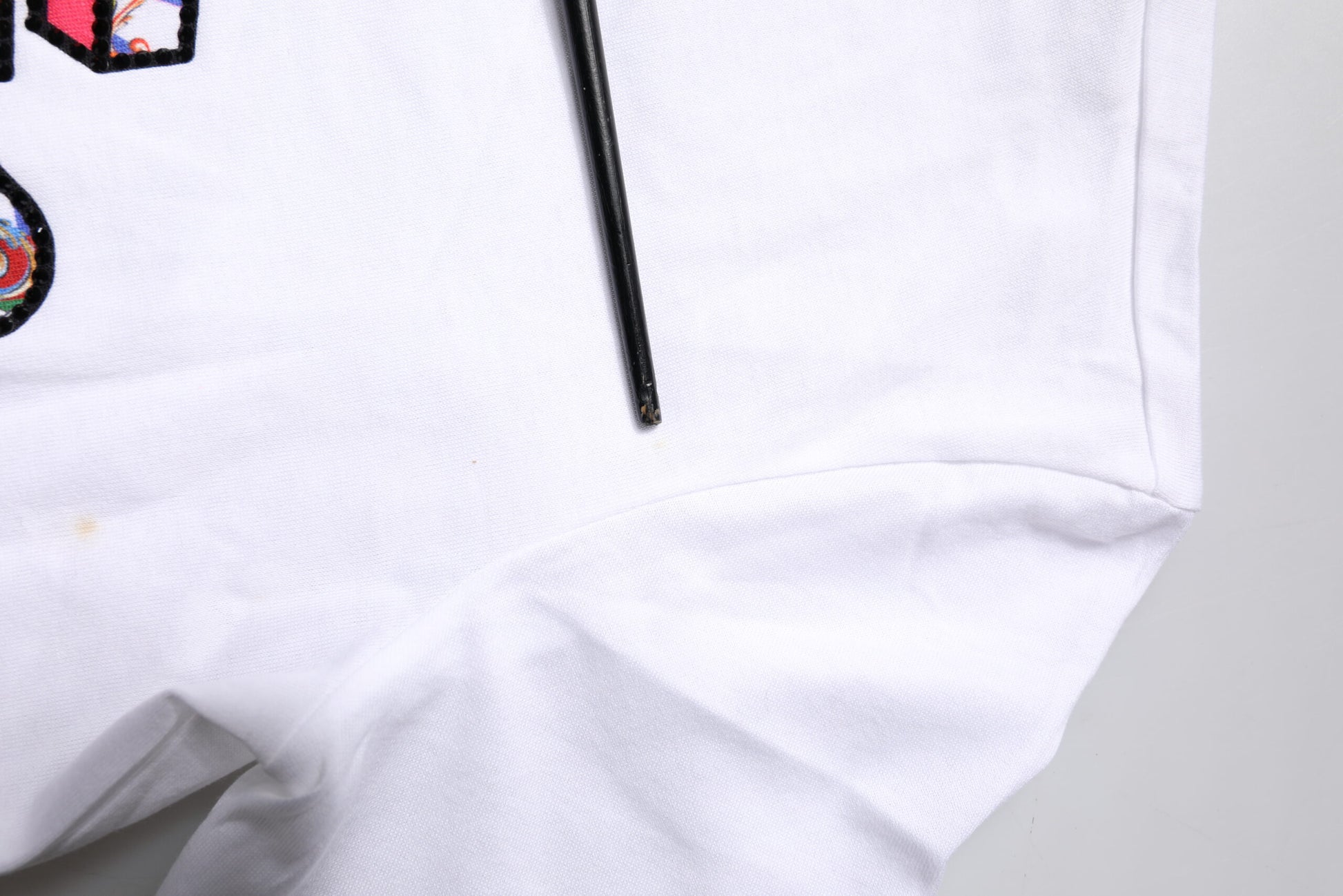 White jacket with black zipper