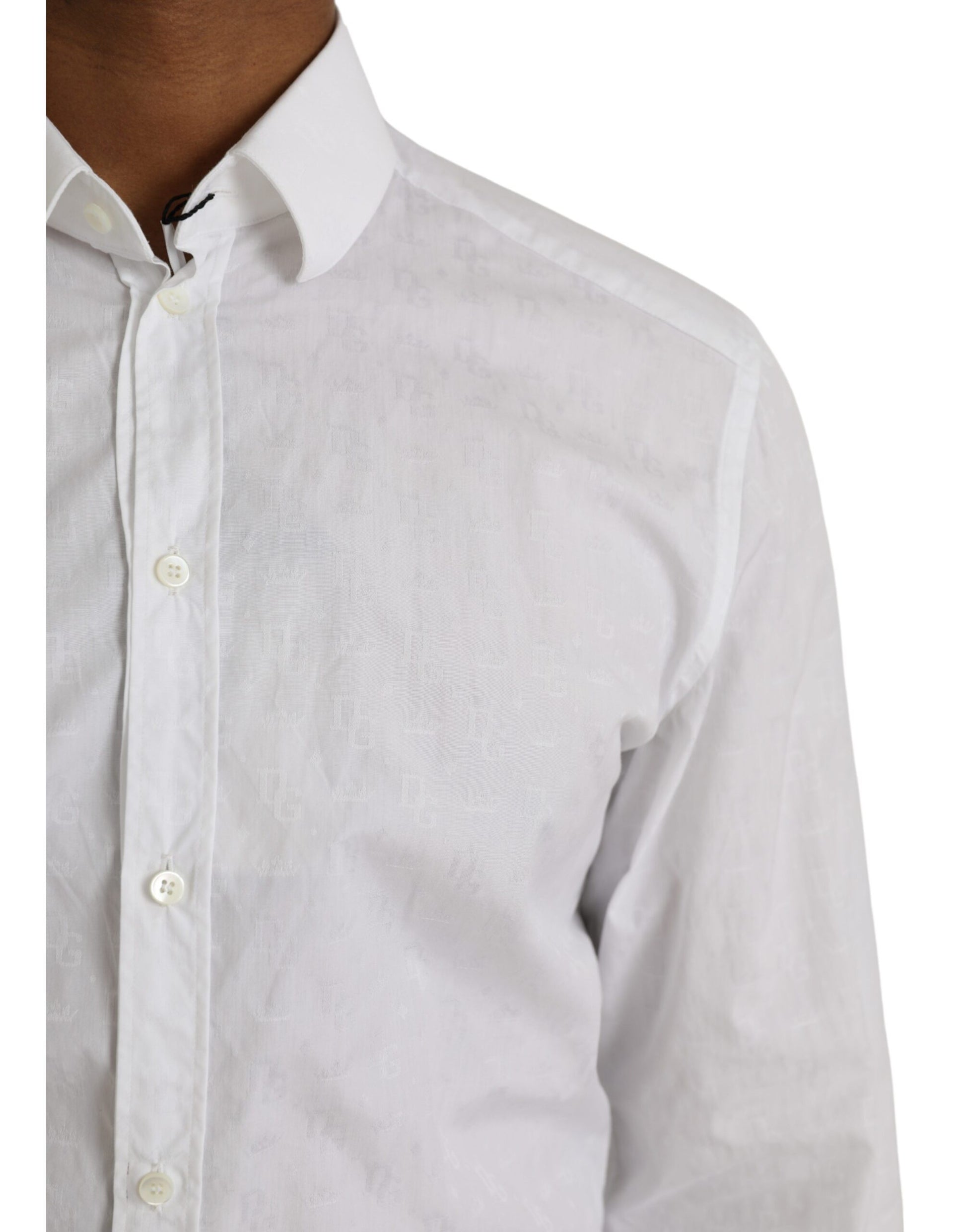 A white cotton long sleeve dress shirt with gold accents