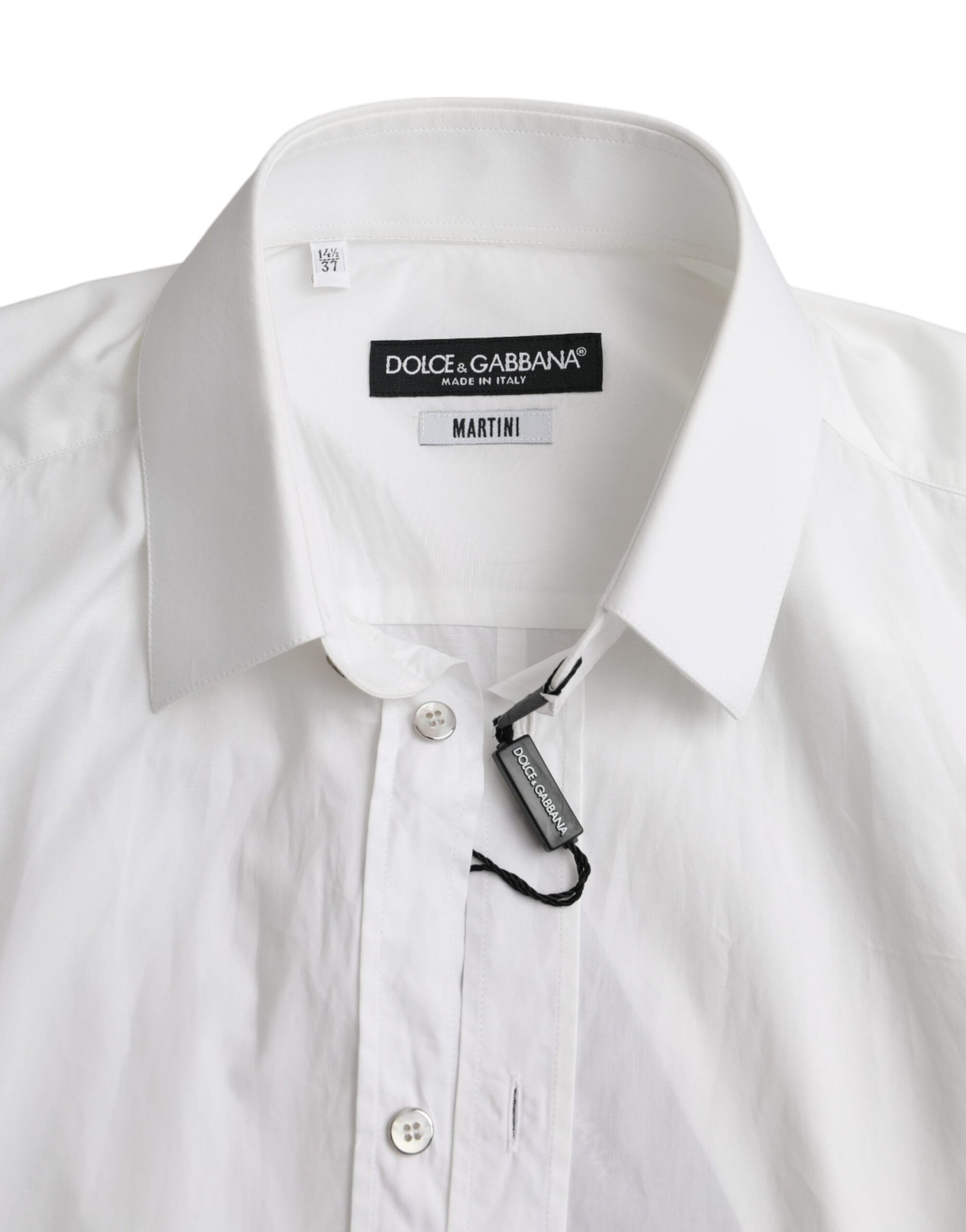 A white cotton long sleeve dress shirt with a Martinis label