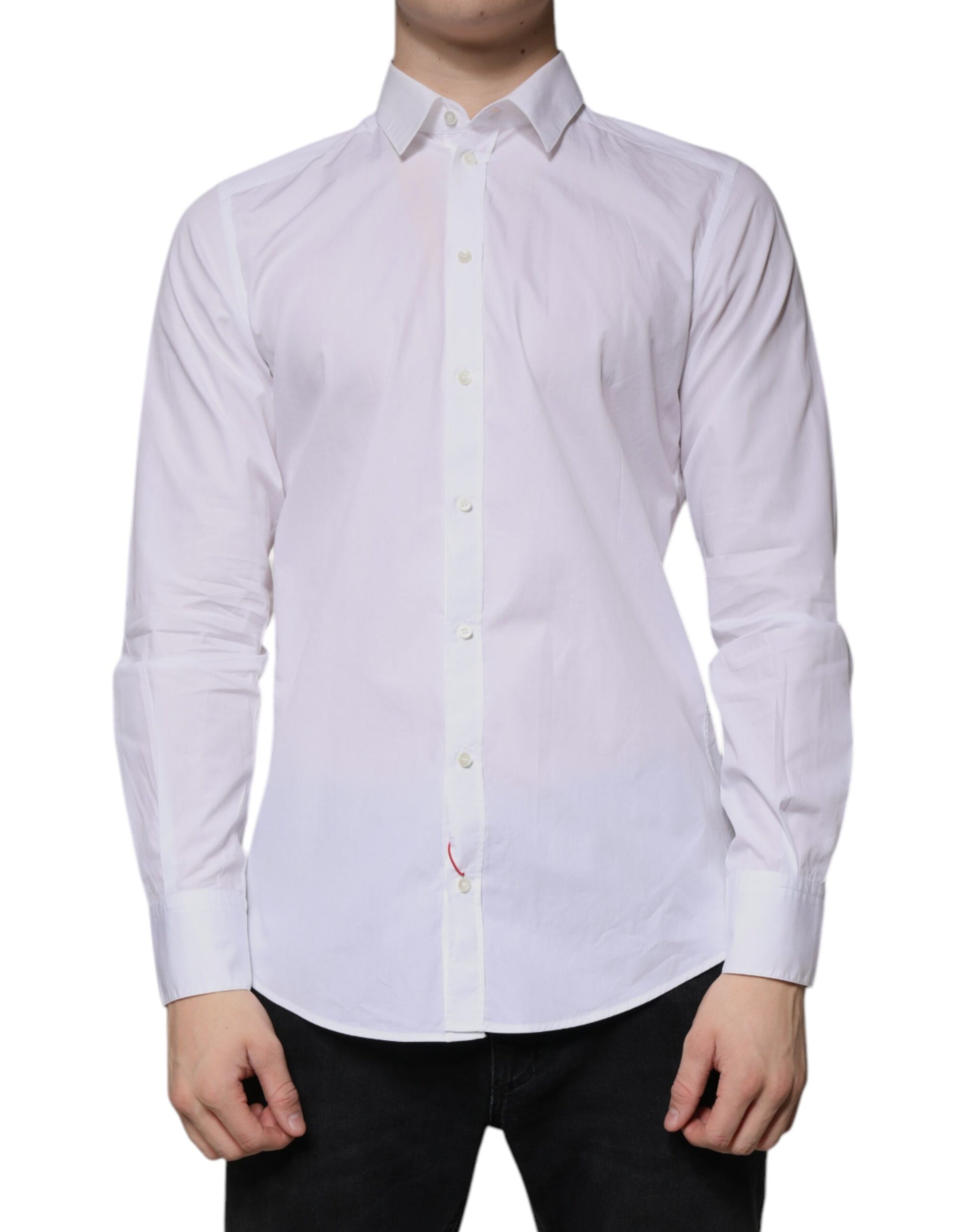 A long sleeved white cotton dress shirt with a collar and button-up front