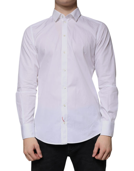 A long sleeved white cotton dress shirt with a collar and button-up front