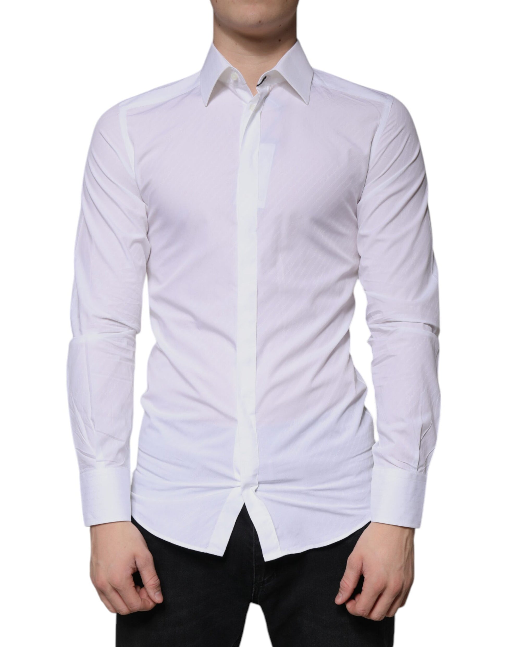 A long sleeved white cotton dress shirt with a collar and buttoned front